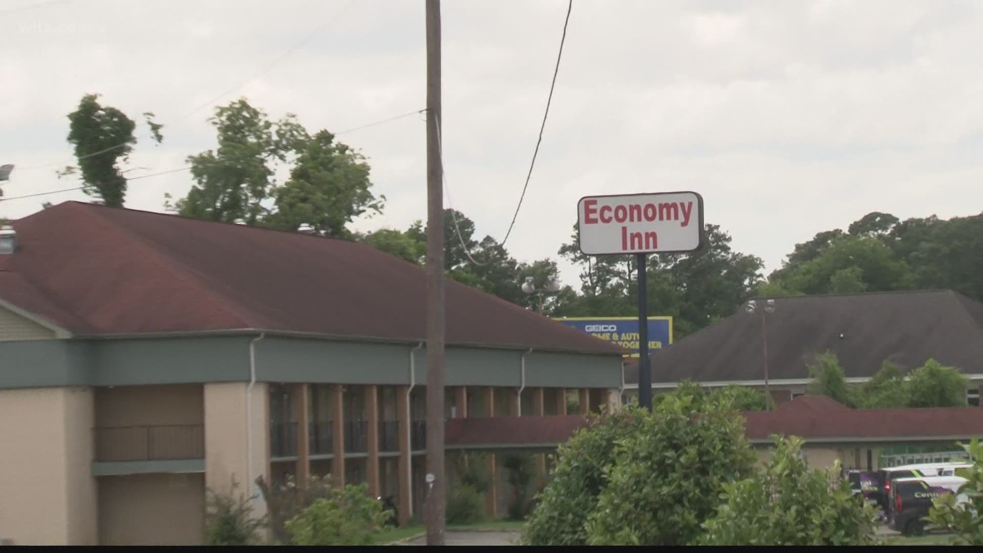 The victim was found dead at the Economy Inn with gunshot wounds to the upper body.