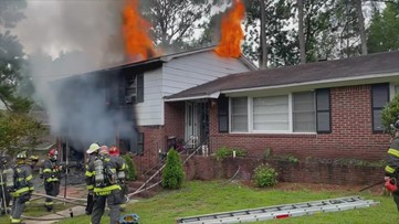 Fire causes heavy damage to Higland Park Drive home, temporarily closes road