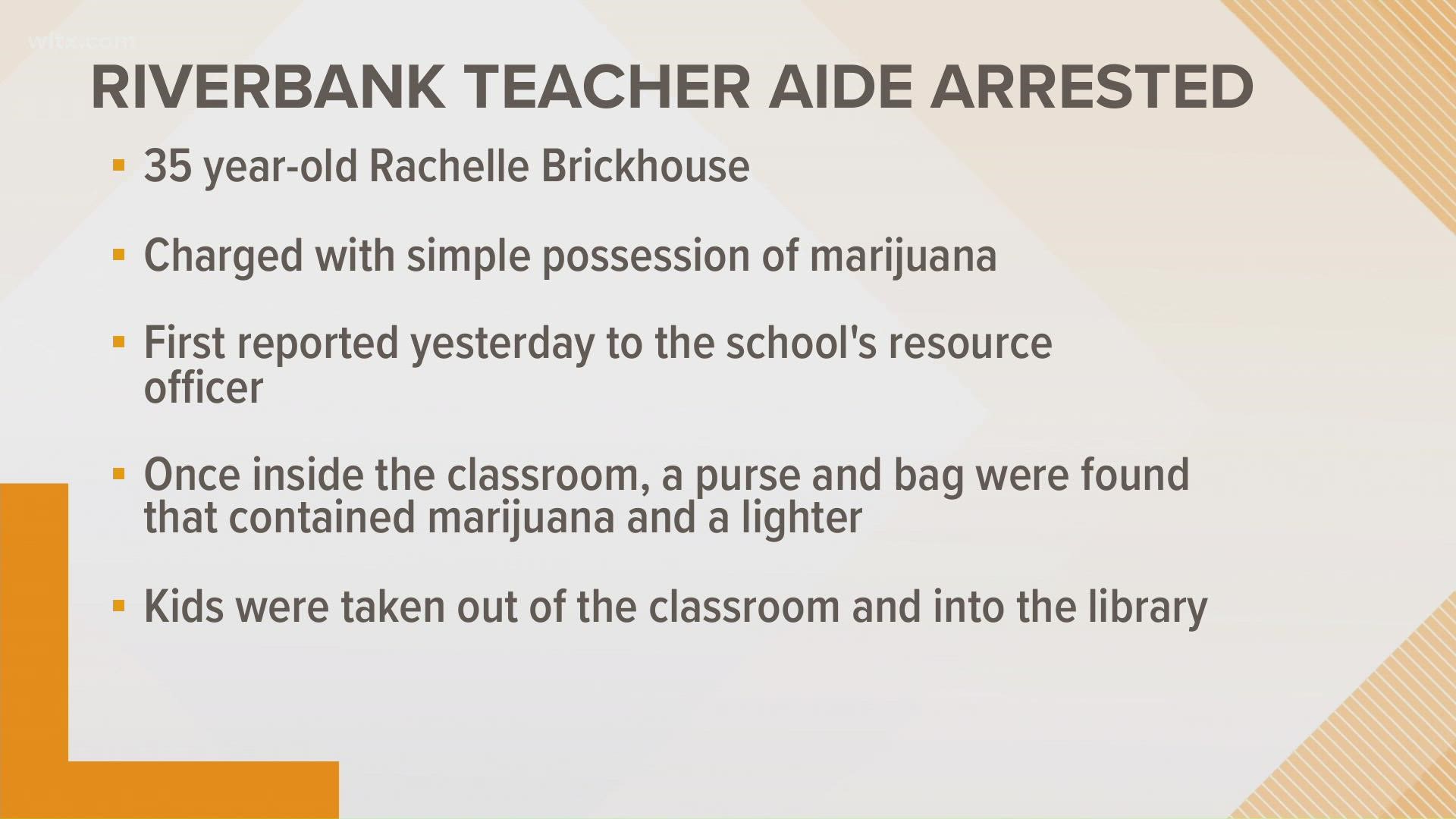 A teacher's aide has been arrested after police say there reports of marijuana in a classroom at a West Columbia elementary school.