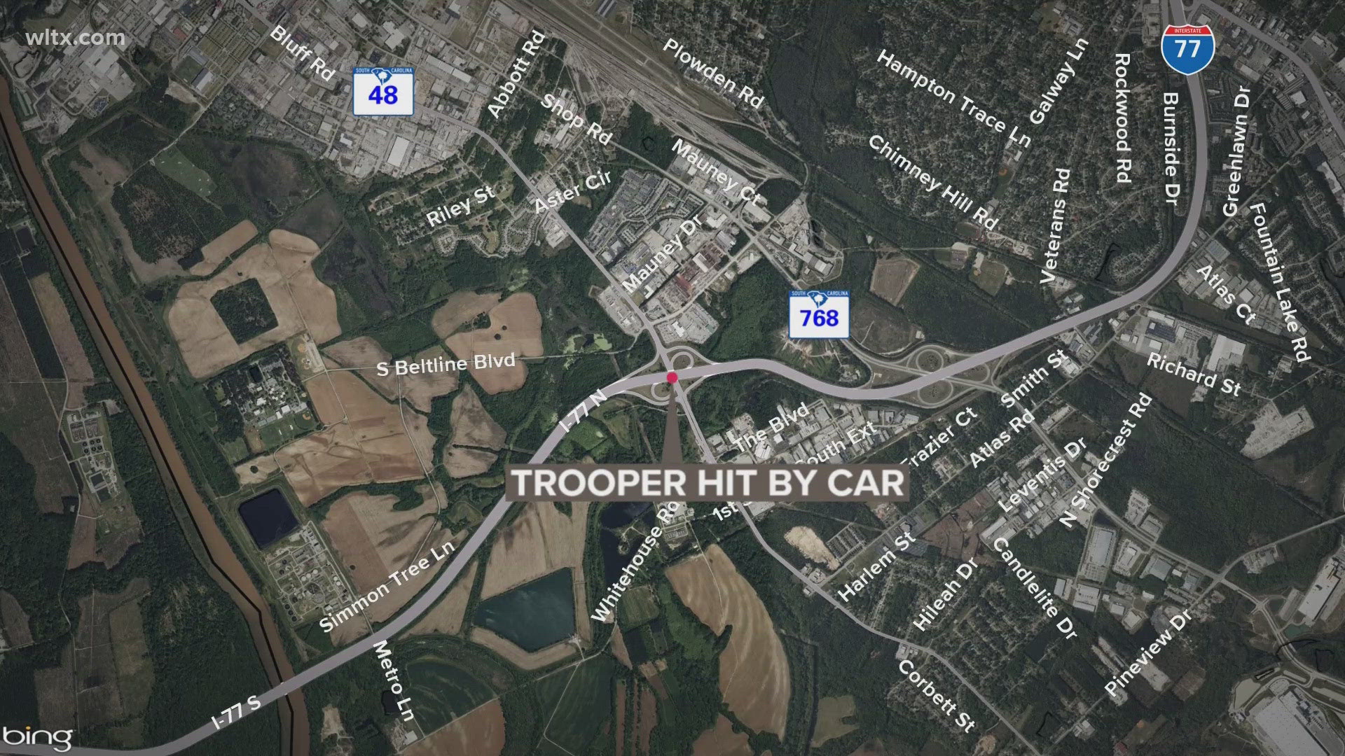 A trooper was hit on I-77 while assisting at a crash scene; officials say wet roads played a role in the incident.