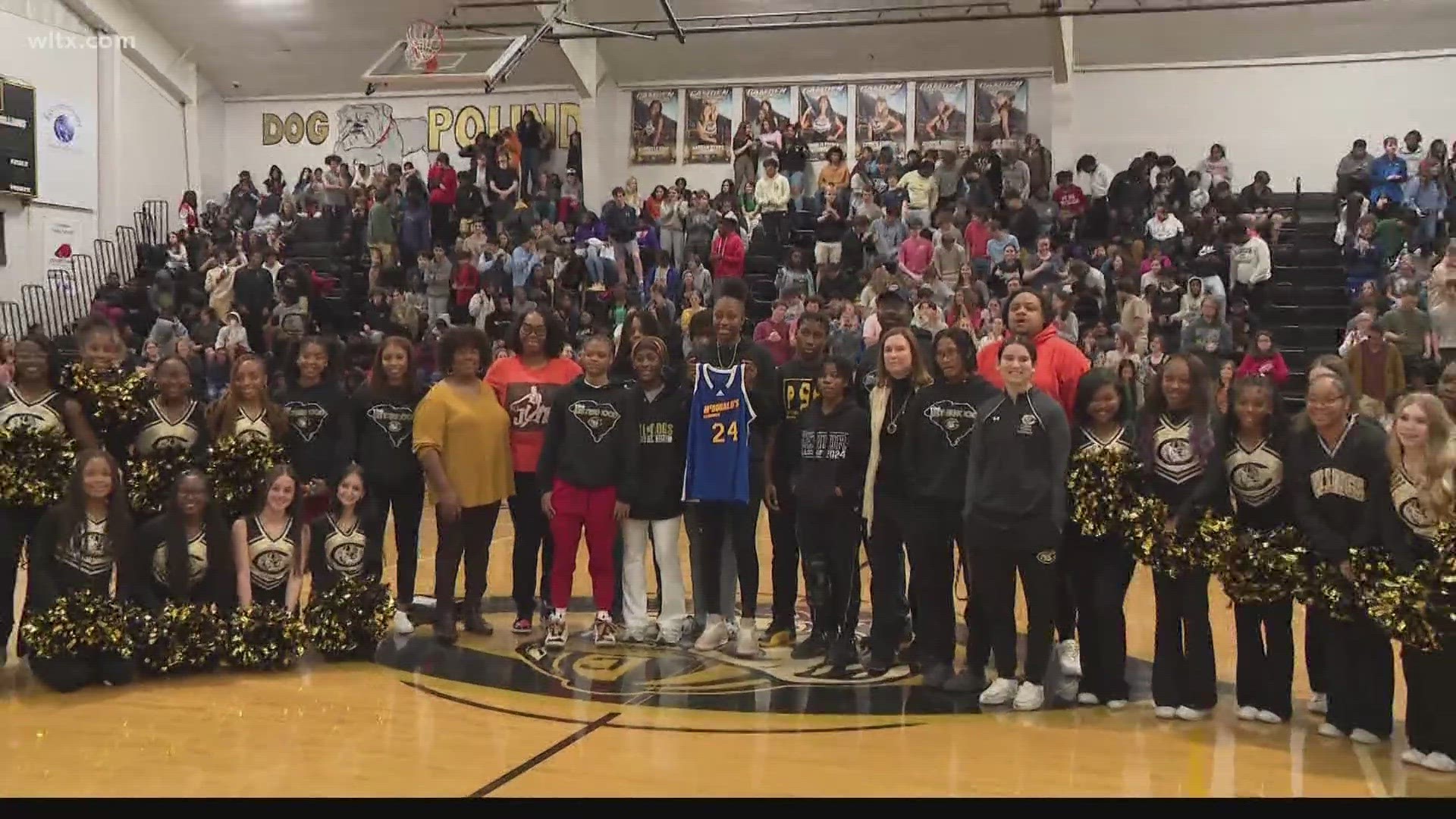 Camden star Joyce Edwards is presented with a special jersey for a special game which is coming up in April.