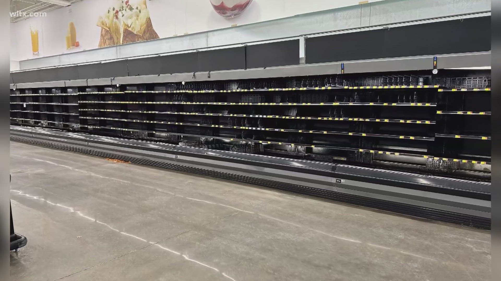 Before word that the dockworker strike was over, many hit grocery stores/gas stations "panic buying", also others from harder hit hurricane areas were also shopping.