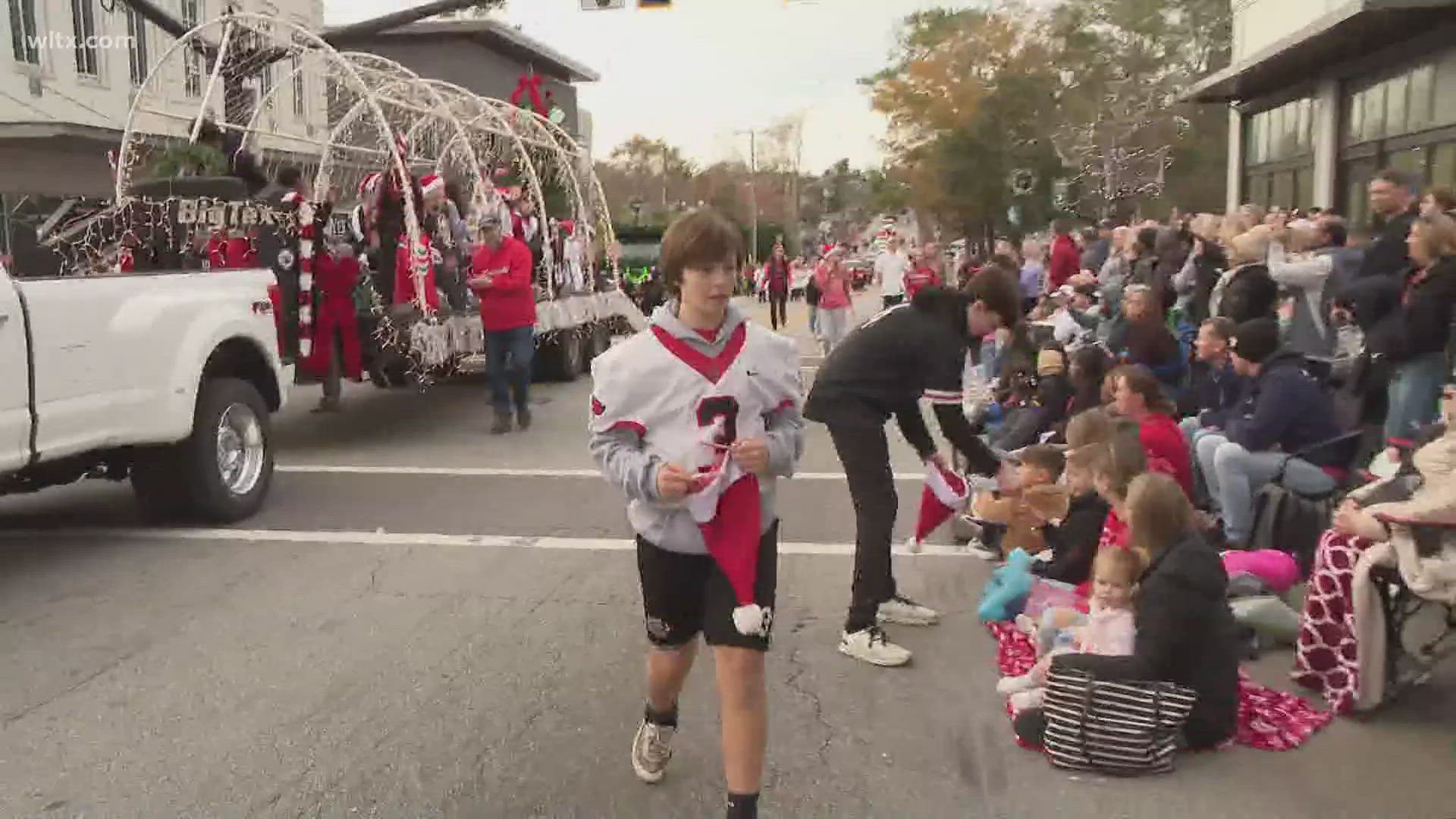 Main street in Lexington saw a long line of floats and vehicles and some walked the route down Main Street.