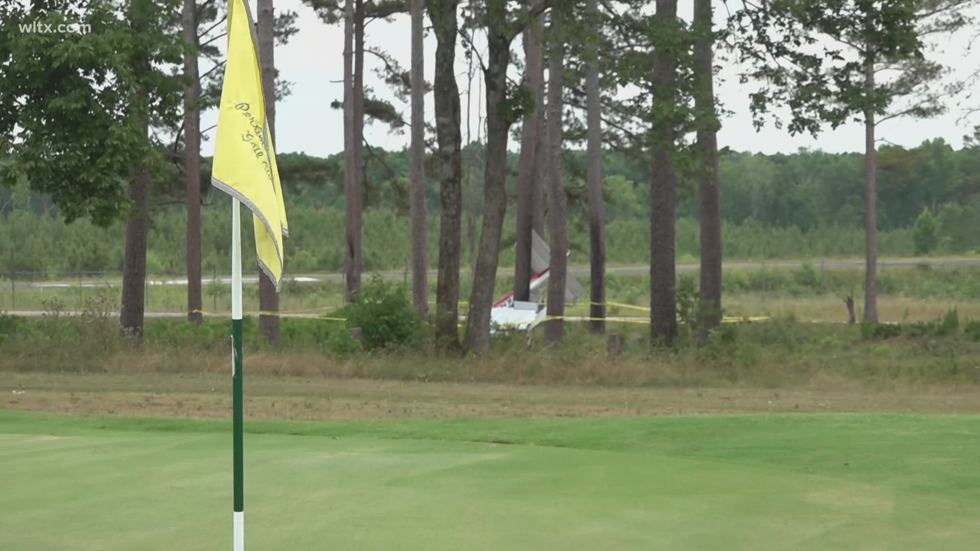 The plane crashed just feet away from golfers playing a round of golf.