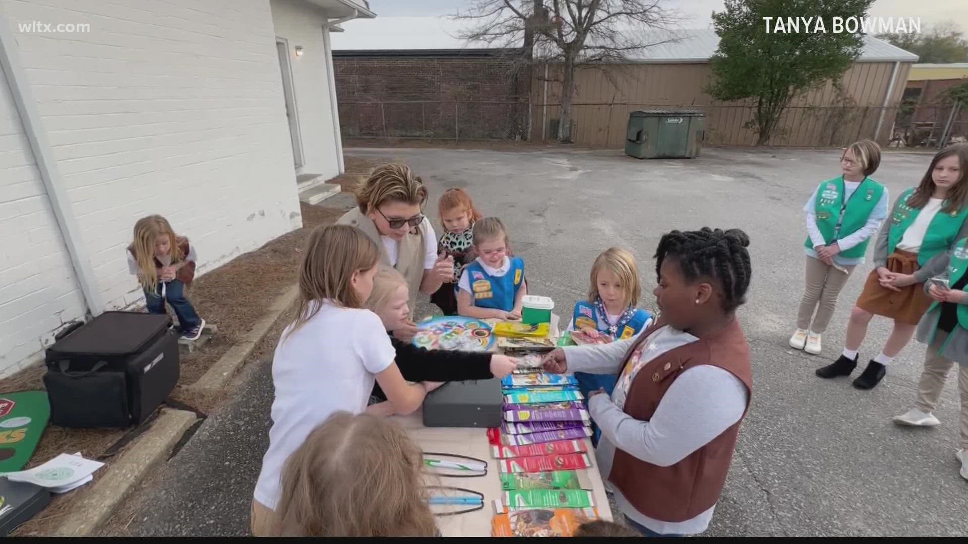 A Sumter Girl Scout troop is learning different life skills as they sell everyone's favorite cookies.