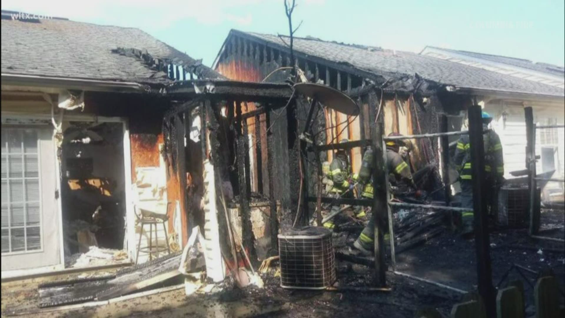 Flames from northeast Columbia house fire caught neighboring home on