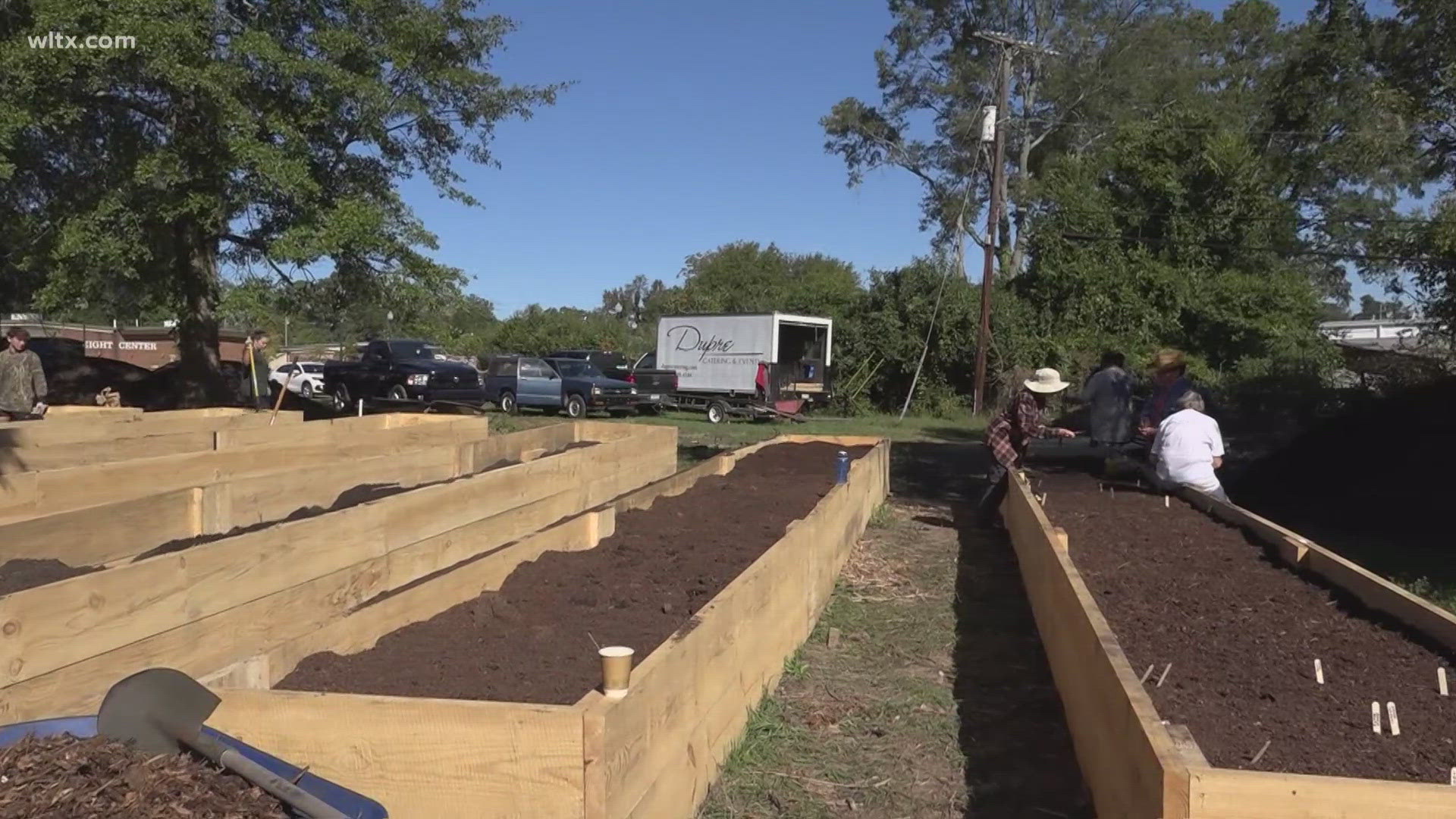 Volunteers with Living Wright Foundation installed a community garden to grow and distribute fresh produce in the area