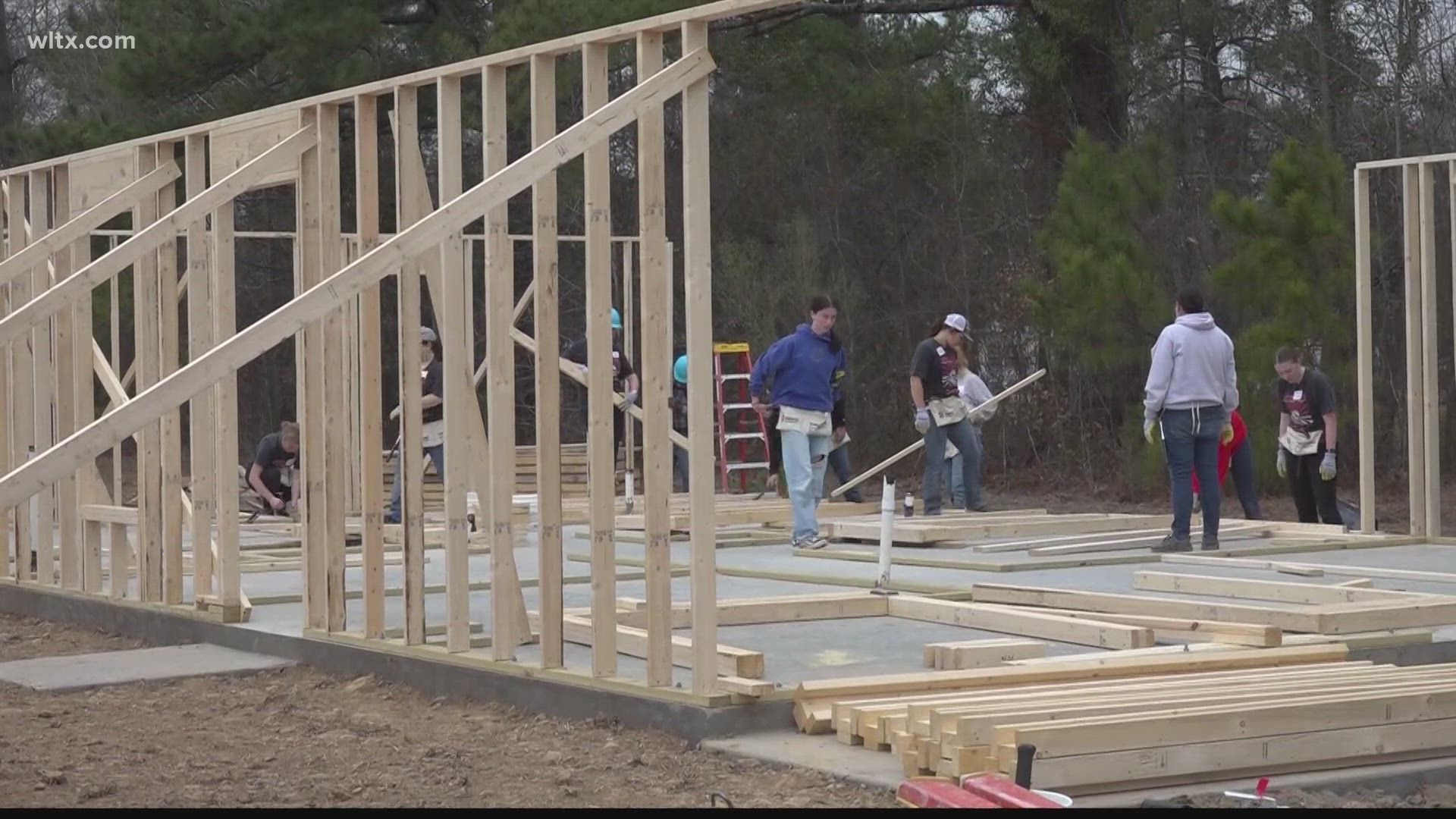 College students from the Midlands and as far away as Utah are helping Habitat for Humanity in Sumter.