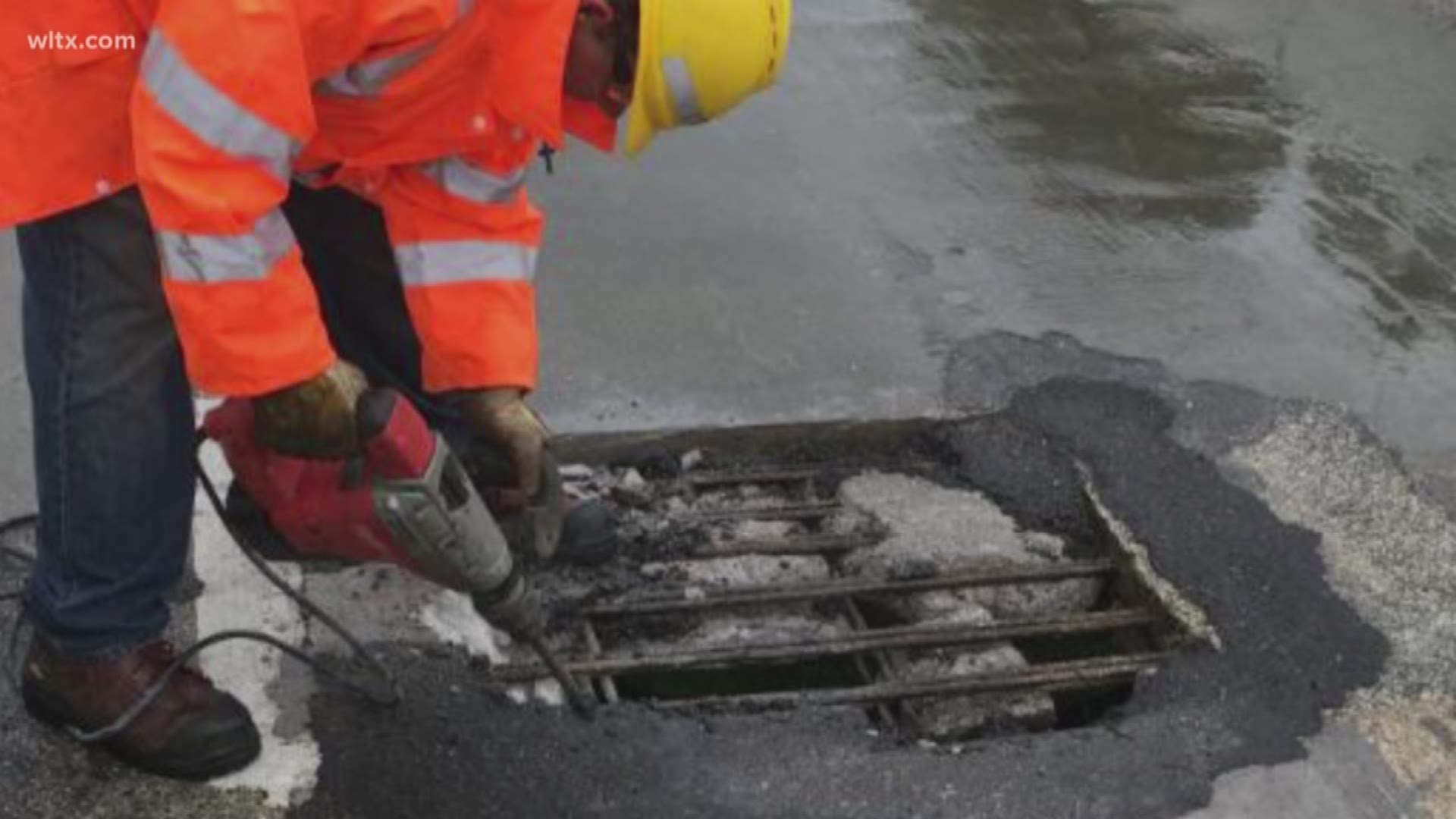 Officials say the pothole, which was caused by aging infrastructure, was reconstructed with concrete.