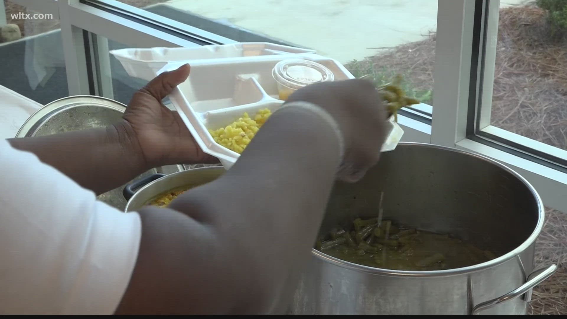 Mothers Against Gun Violence hosted the free Thanksgiving dinner giveaway the day before Thanksgiving.