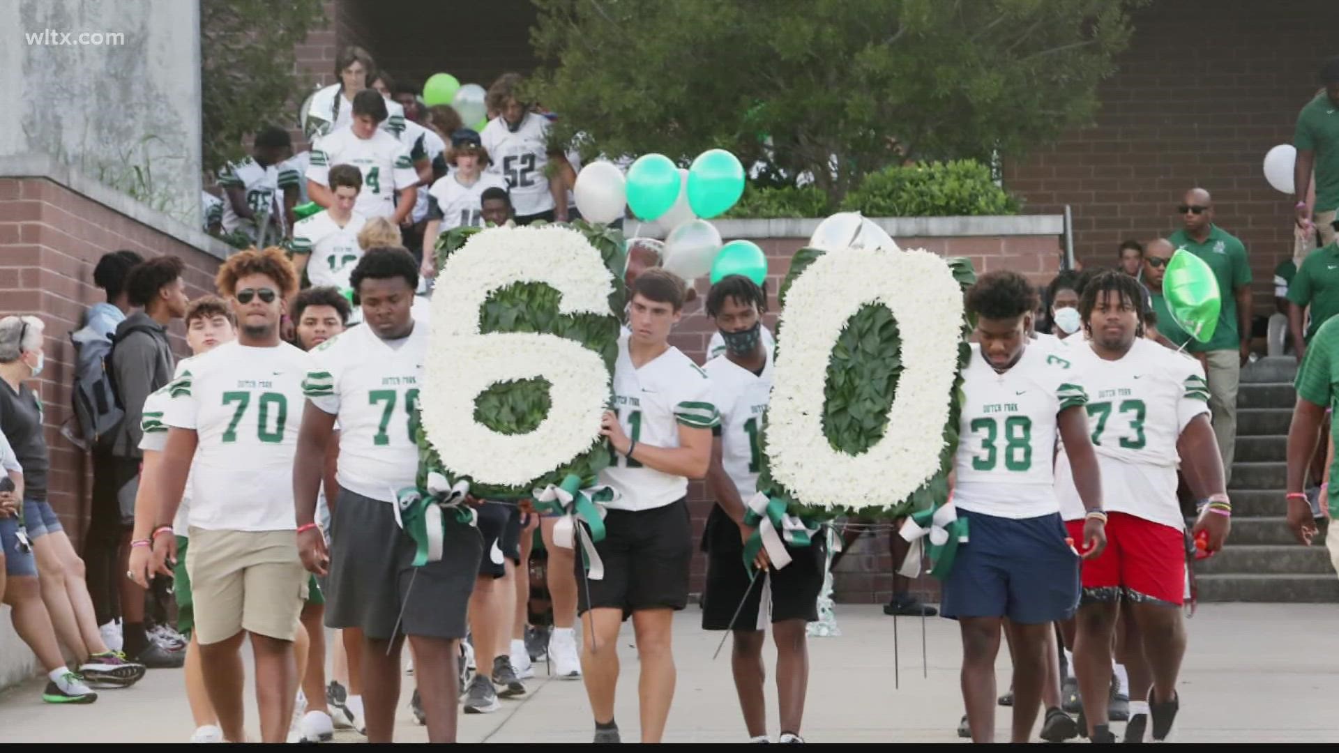 Dutch Fork High School held a memorial service Friday for football player Jack Alkhatib, who died suddenly after collapsing at practice on Tuesday.