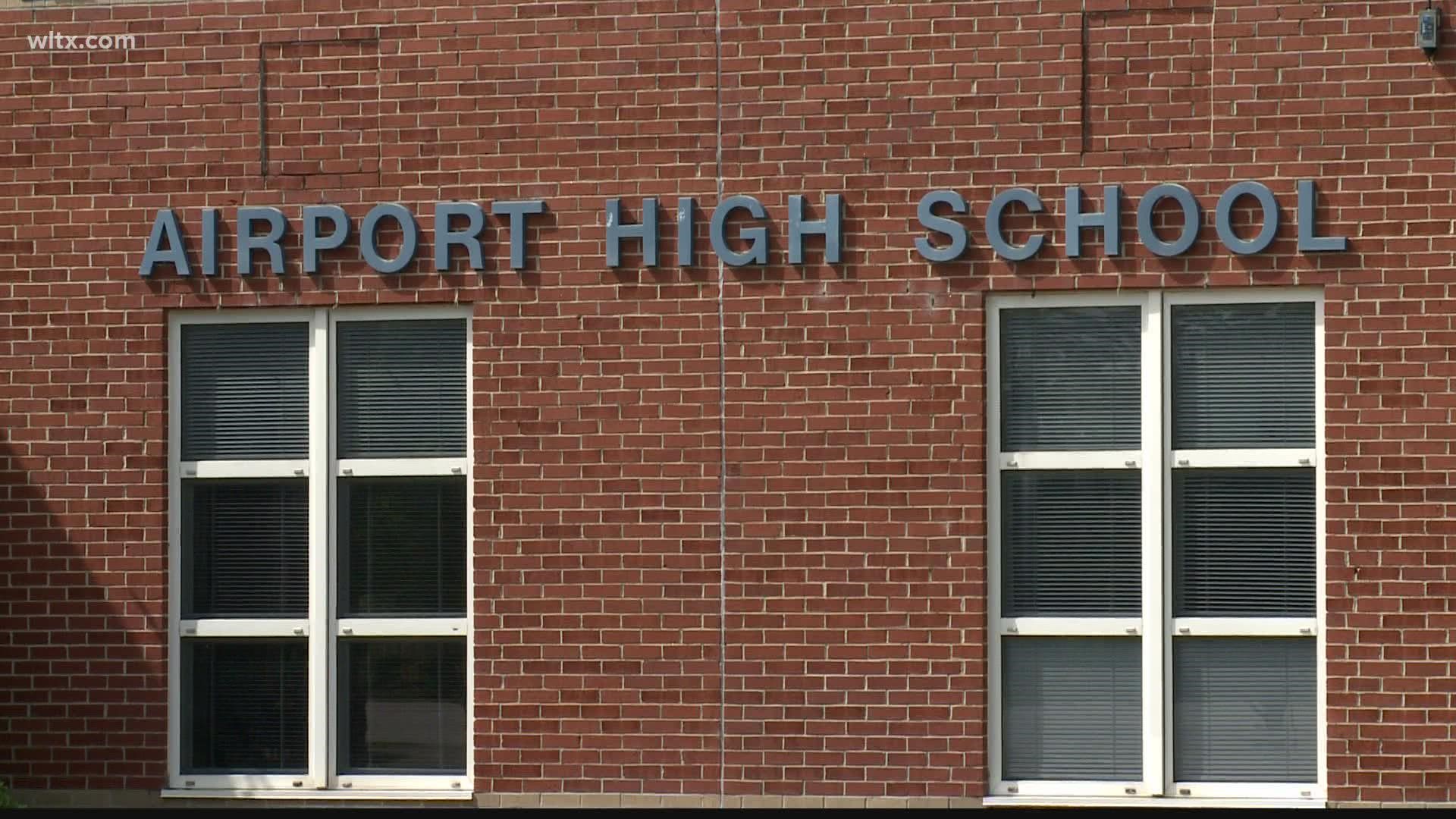 An 18-year-old Airport High School student was arrested after authorities found a gun in his backpack on Monday.