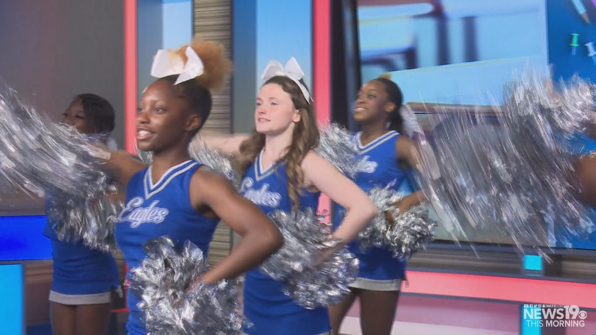 The Airport High School cheerleaders welcome students in Lexington Two back to school.