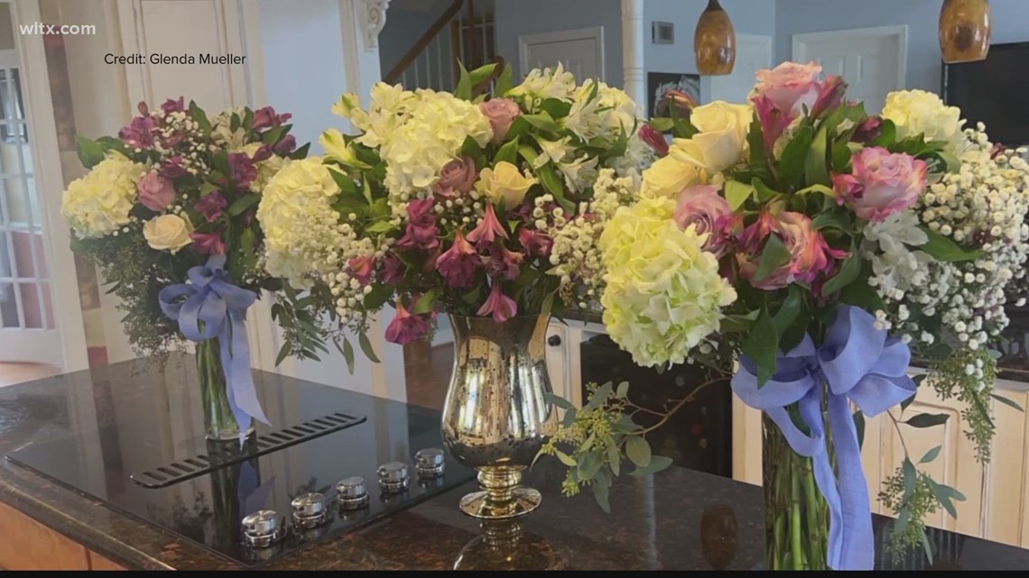 Colorful bundles of flowers are being given out to people in Orangeburg