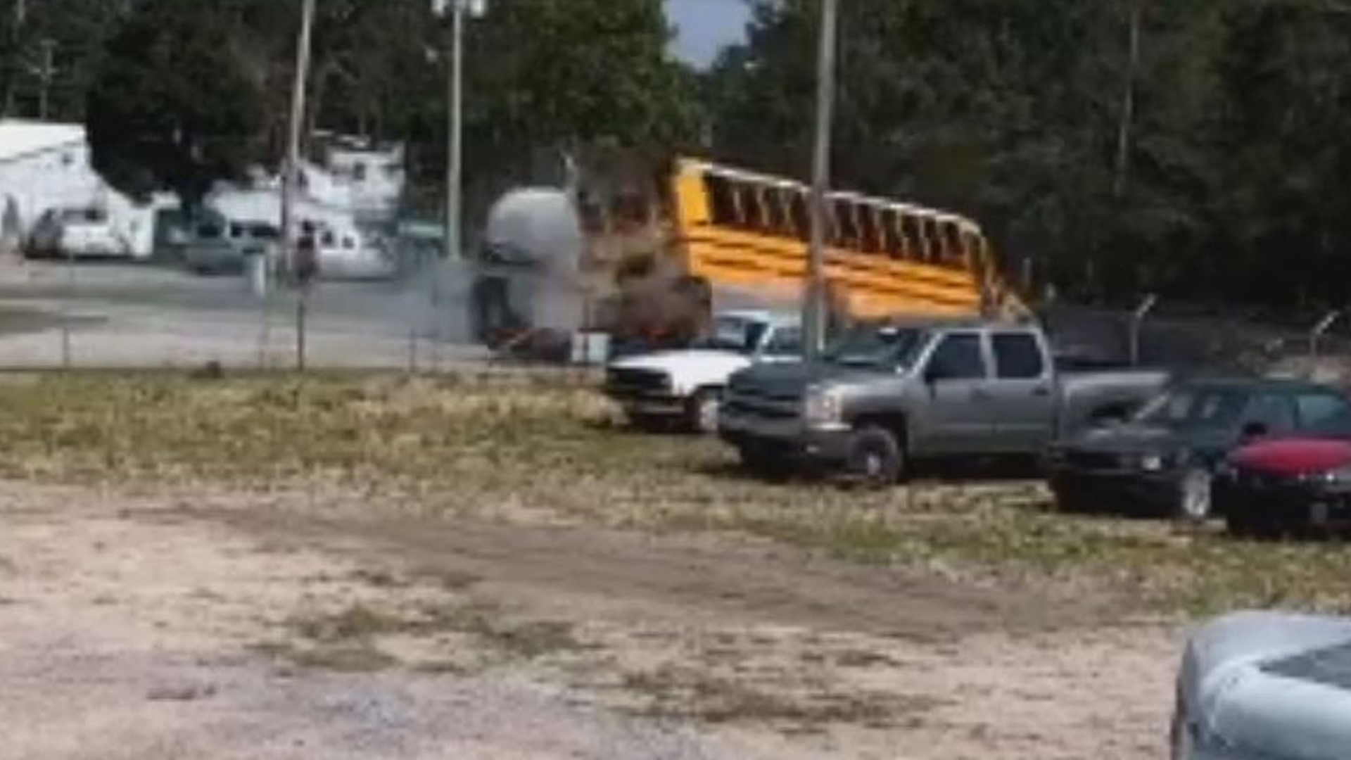 A crash between a South Carolina school bus and a tanker truck was caught on camera.