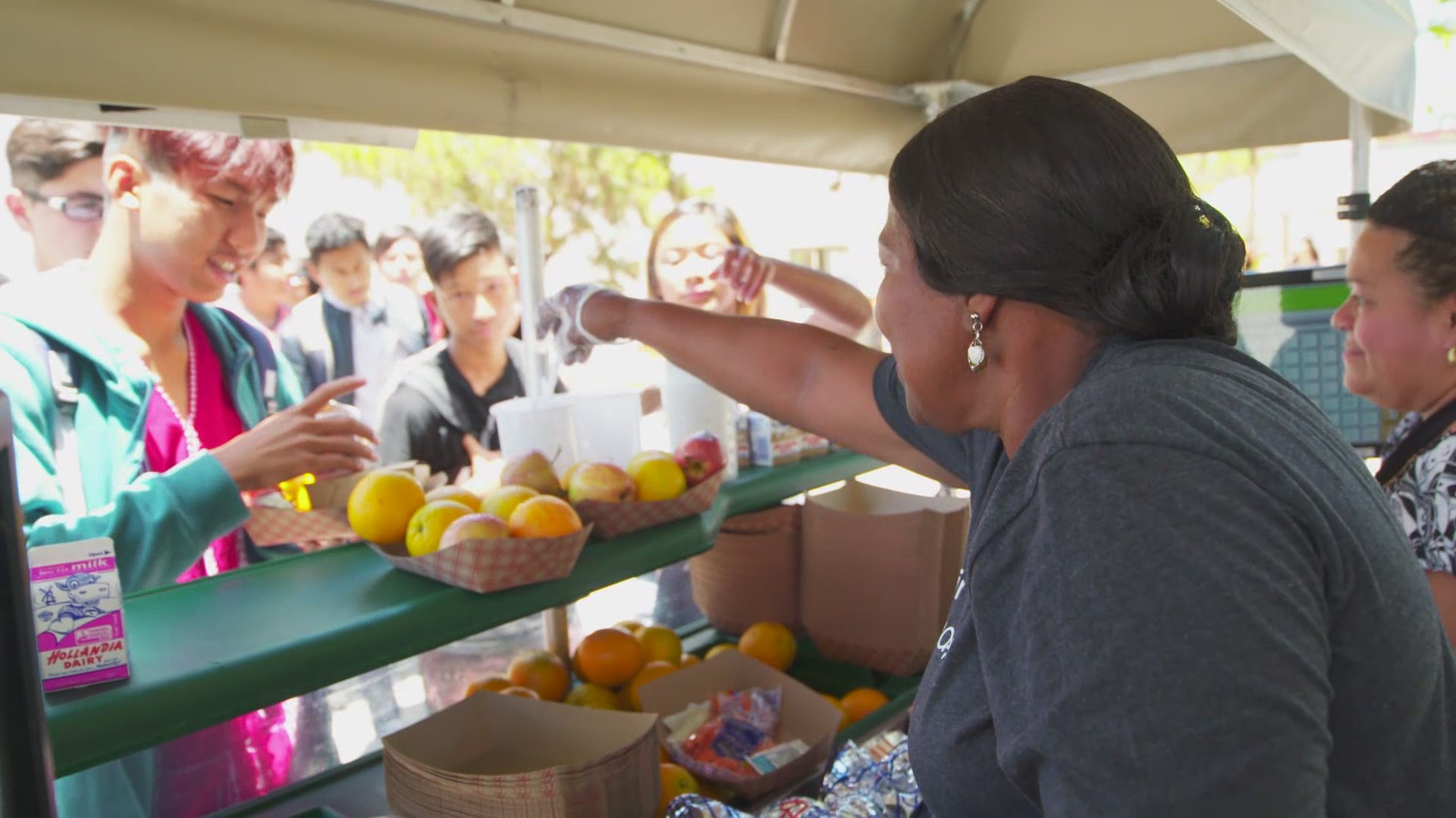 Auntie Debra, as she's known at Hoover High School, doles out a heaping helping of hospitality every lunch hour. It's just her first course of kindness.