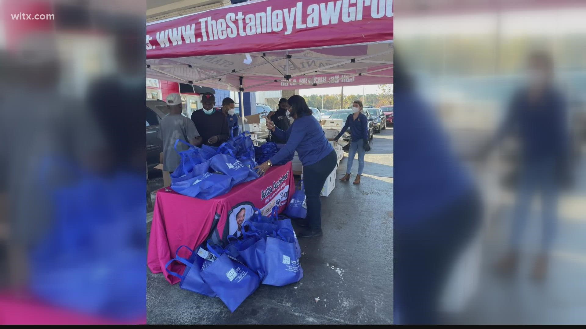 The Stanley Law Group gave away 200 turkeys and dinner fixings today.  The event was supposed to happen at noon but many arrived early and all turkeys were given out