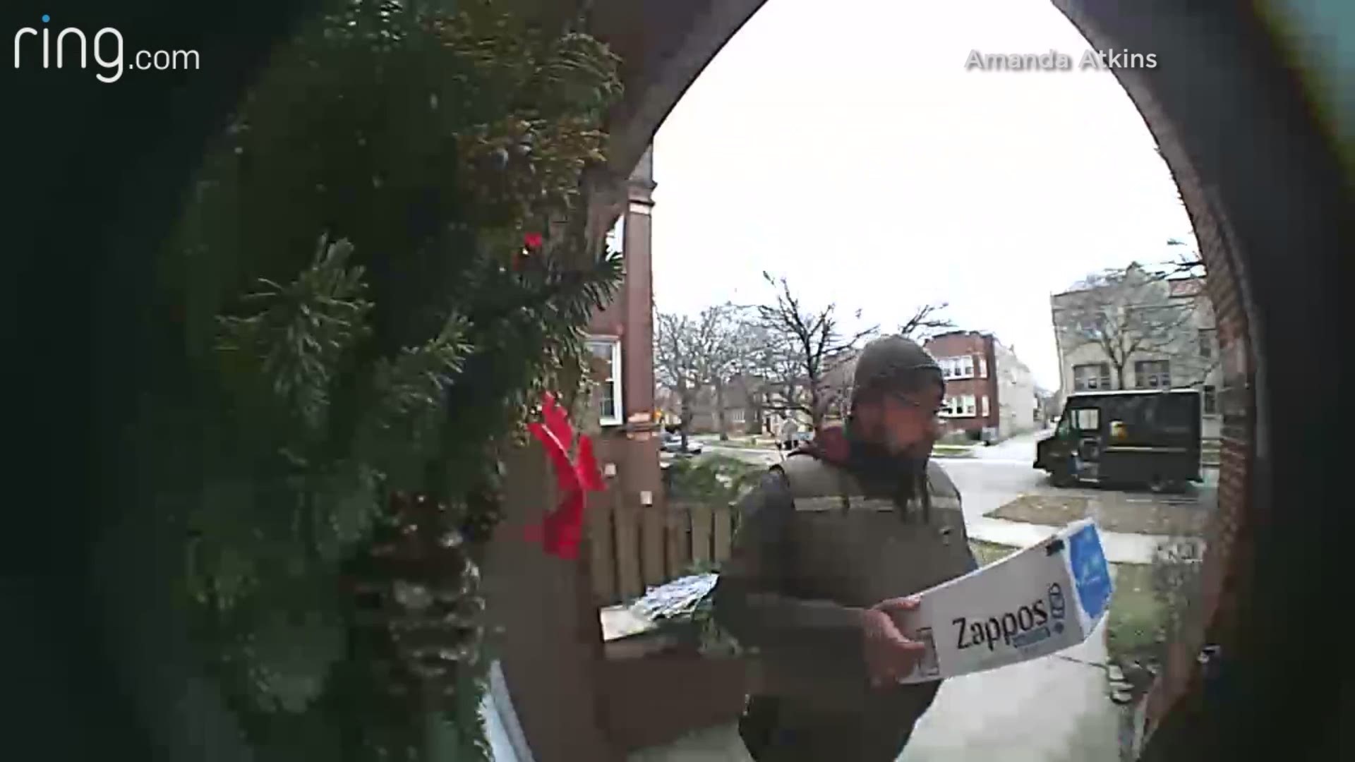 A Chicagoan's Ring app caught an unexpectedly friendly moment on Wednesday when a squirrel jumped onto the back of a UPS driver as he made a delivery.