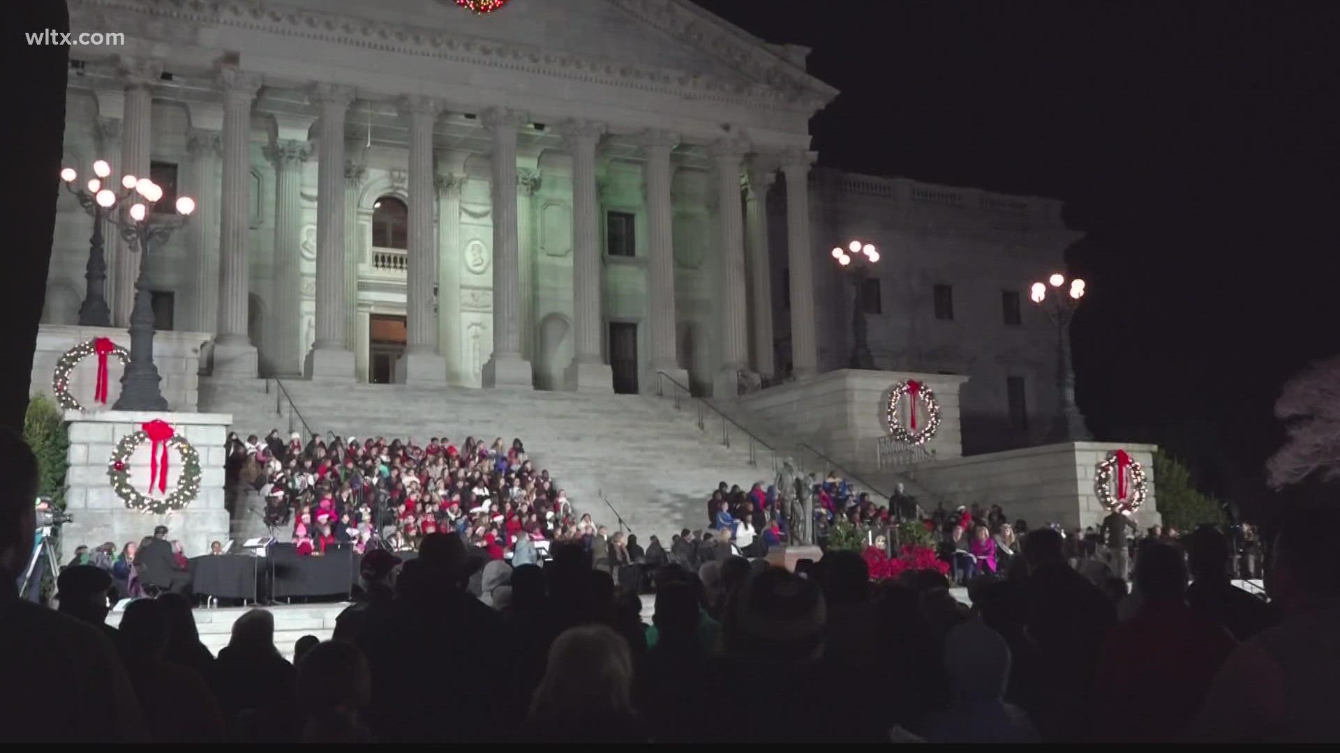 The sights and sounds of the annual event featured school choirs and the lighting of the State Christmas Tree
