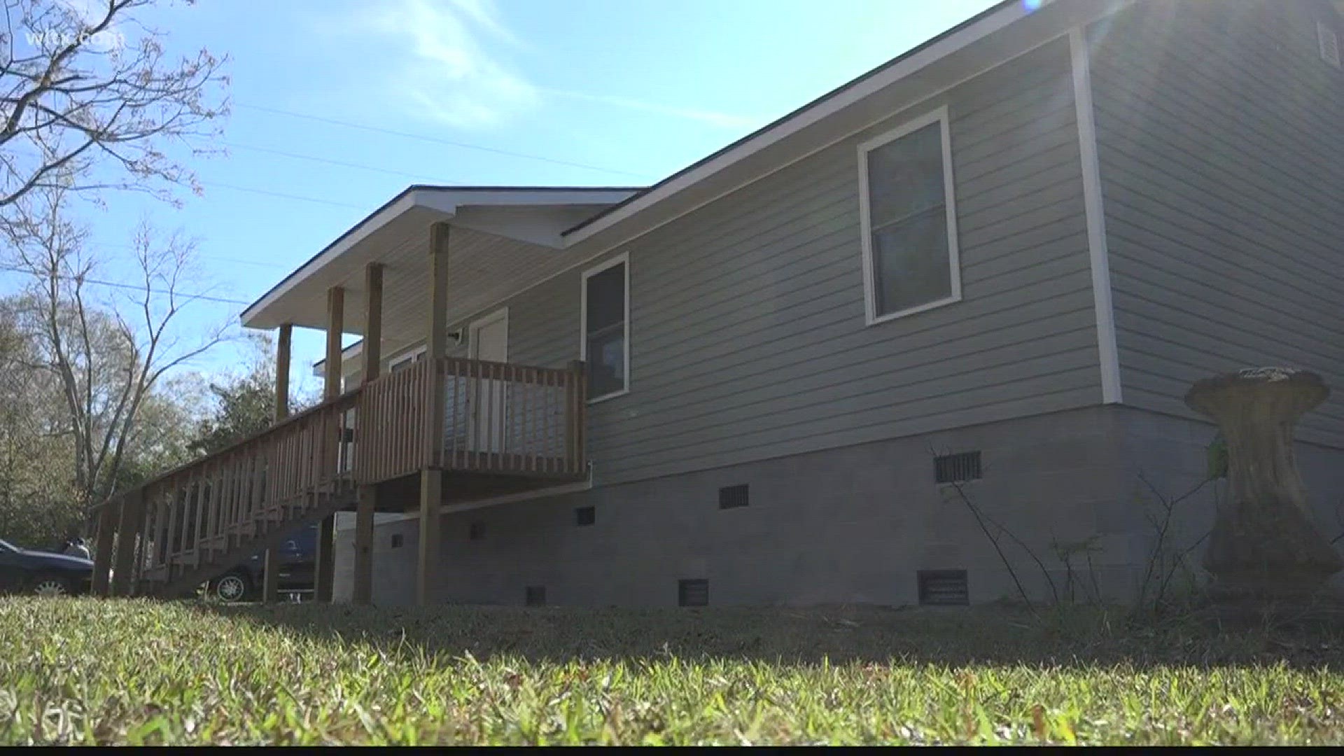 A woman who lost her home in the 2015 October Flood cut the ribbon to her new home on Saturday.  News19's Lana Harris reports.
