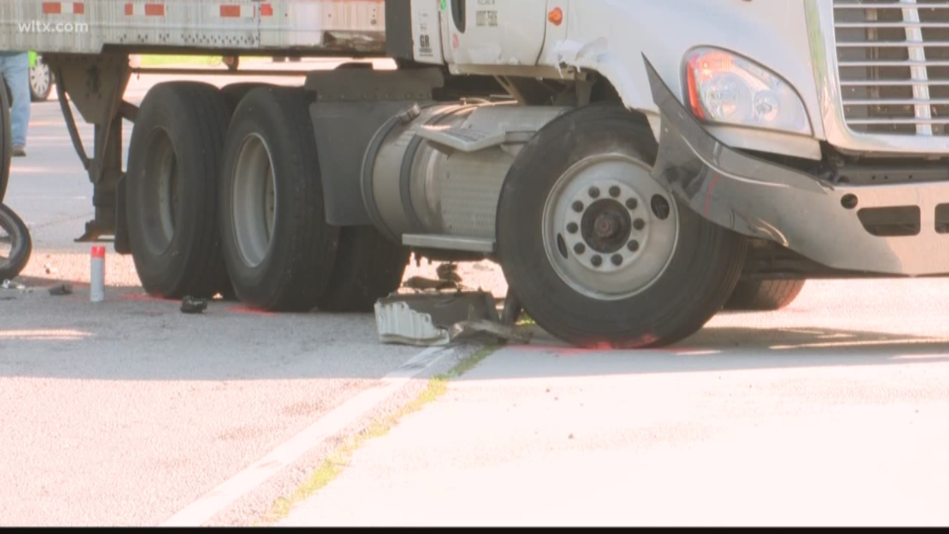Troopers say the victim, identified as 26-year-old Wesley Grant Hutto, collided with a turning tractor trailer on Charleston Highway.