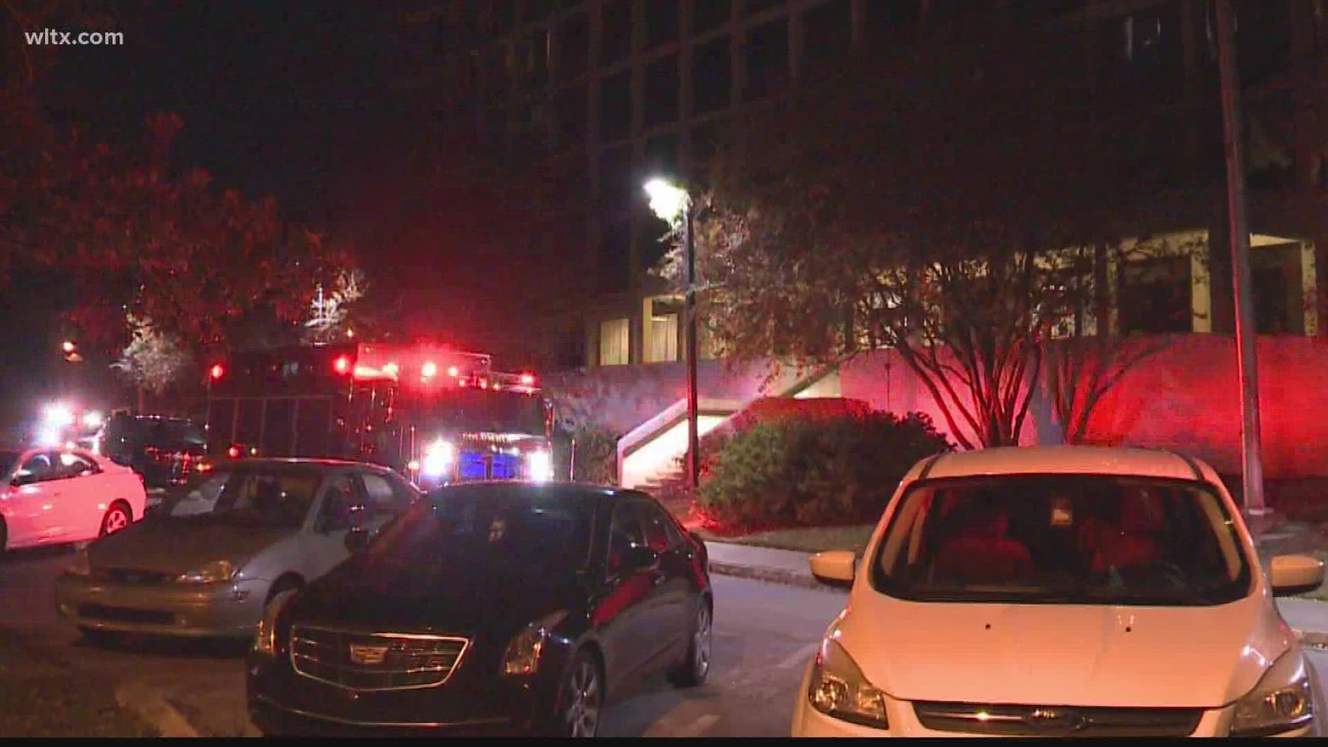 Blaze began around 5 p.m. Sunday at Christopher Towers, leaving minimal damage but flooding and power outage due to sprinkler system