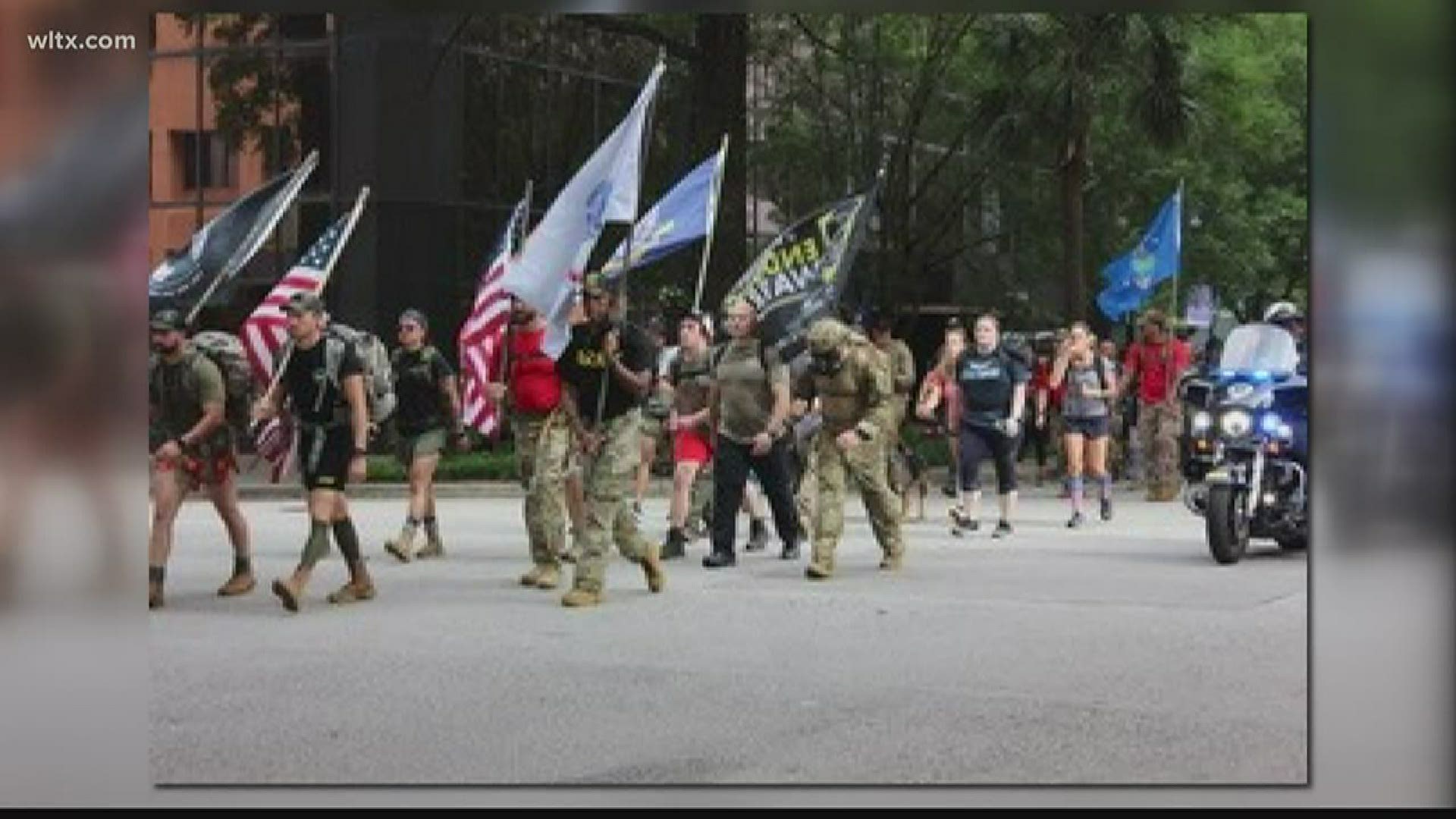 Nearly 70 people participated in a walk to honor those on Memorial Day