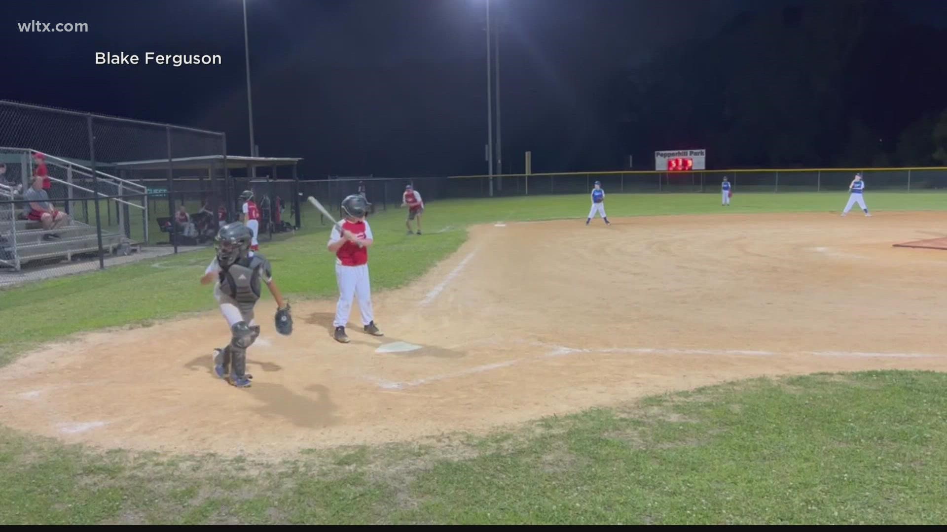 Players and spectators at a North Charleston youth baseball game were sent running for cover when gunshots rang out from a nearby parking lot.