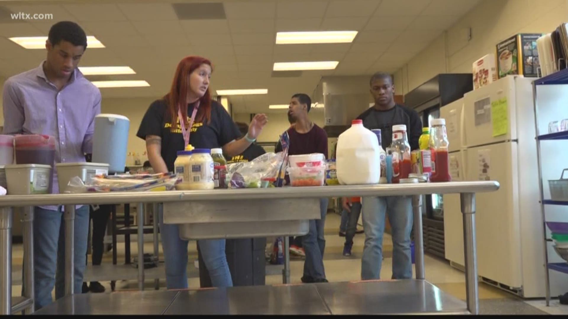 Students make lunches for teachers at the school