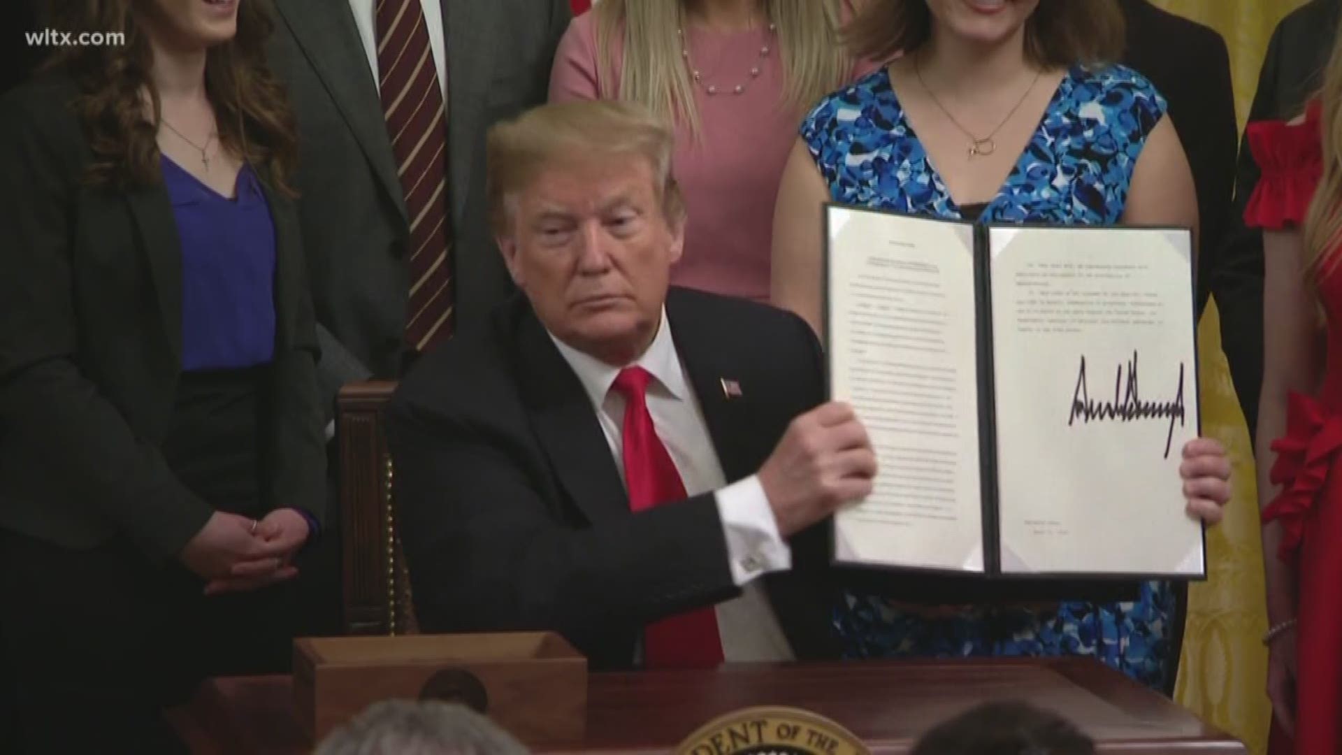 President Donald Trump signed an executive order on Thursday requiring U.S. colleges to certify that they protect free speech on their campuses or risk losing federal research funding.