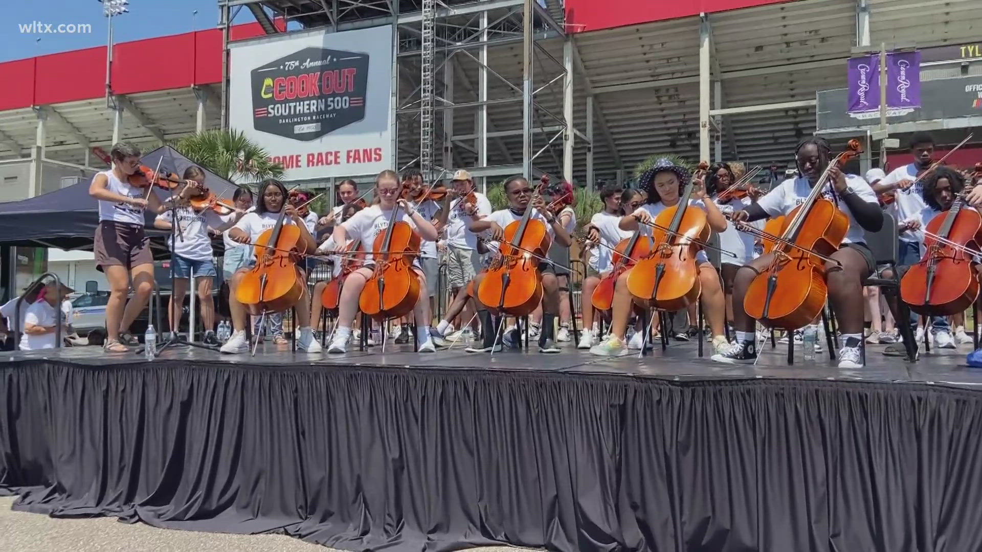 Students, 68 in total, from Blythewood High School made history by becoming the first student orchestra to perform before a race. 