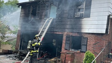 Fire causes heavy damage to Highland Park Drive home, temporarily closes road