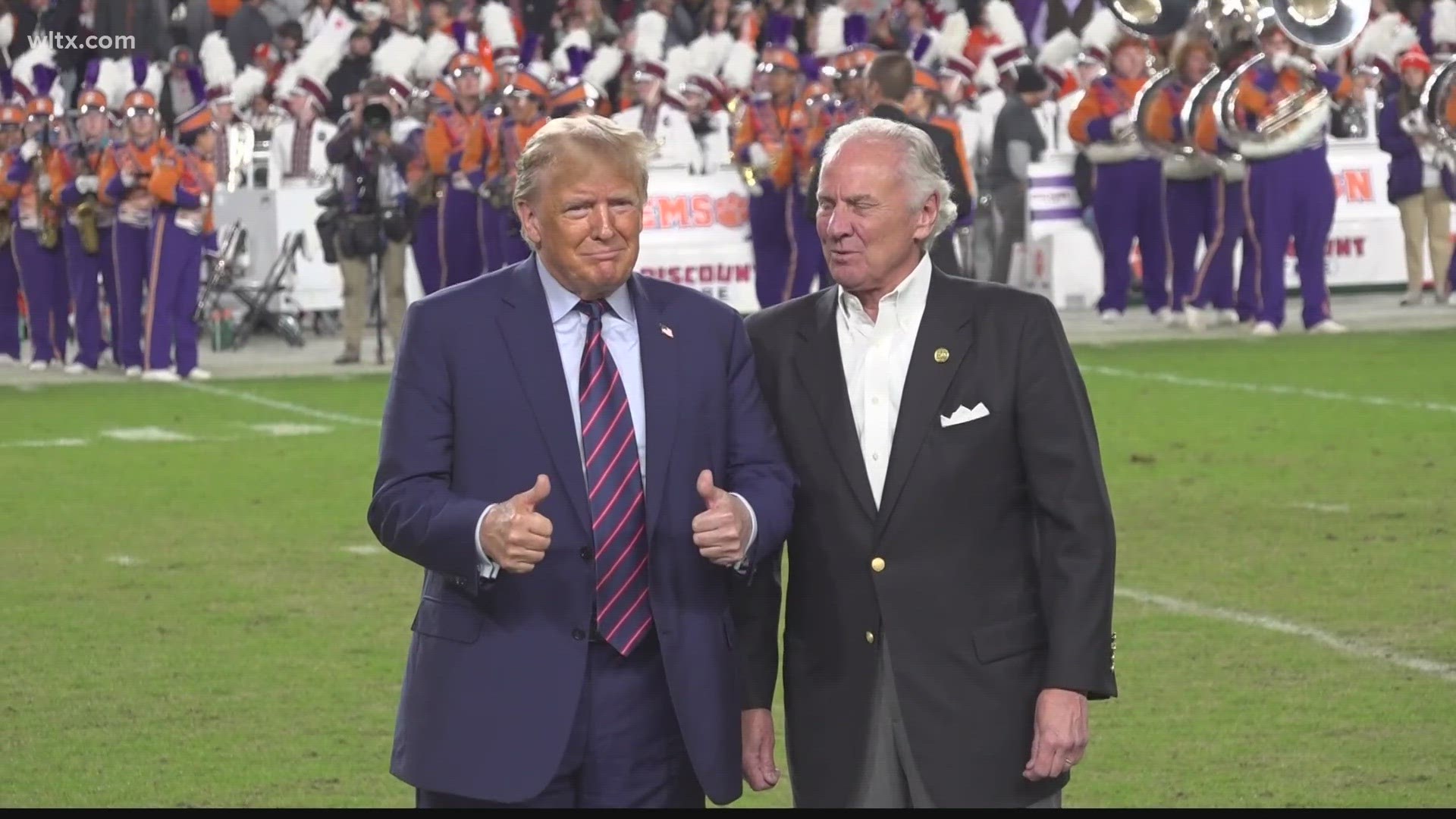 Former President Donald Trump got cheers and a few boos as he took the field for the South Carolina Clemson game.