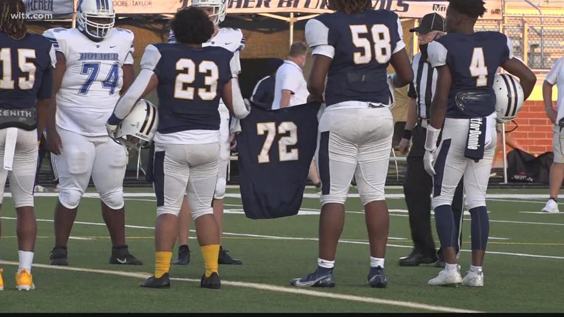 Keenan High Scholl pays tribute to Donadrian Robinson at football game | wltx.com