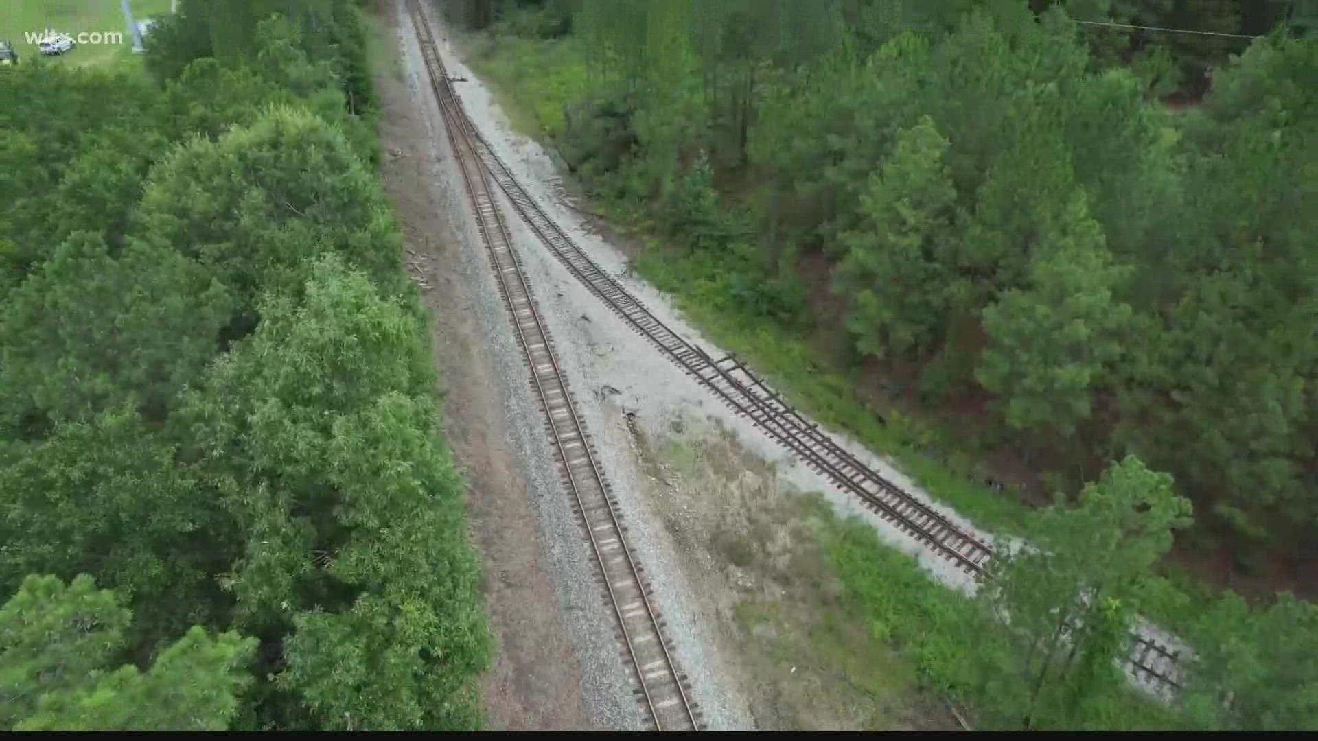 The Columbia-Richland Fire Department says two people were hurt after a train derailed in south Columbia early Monday morning.