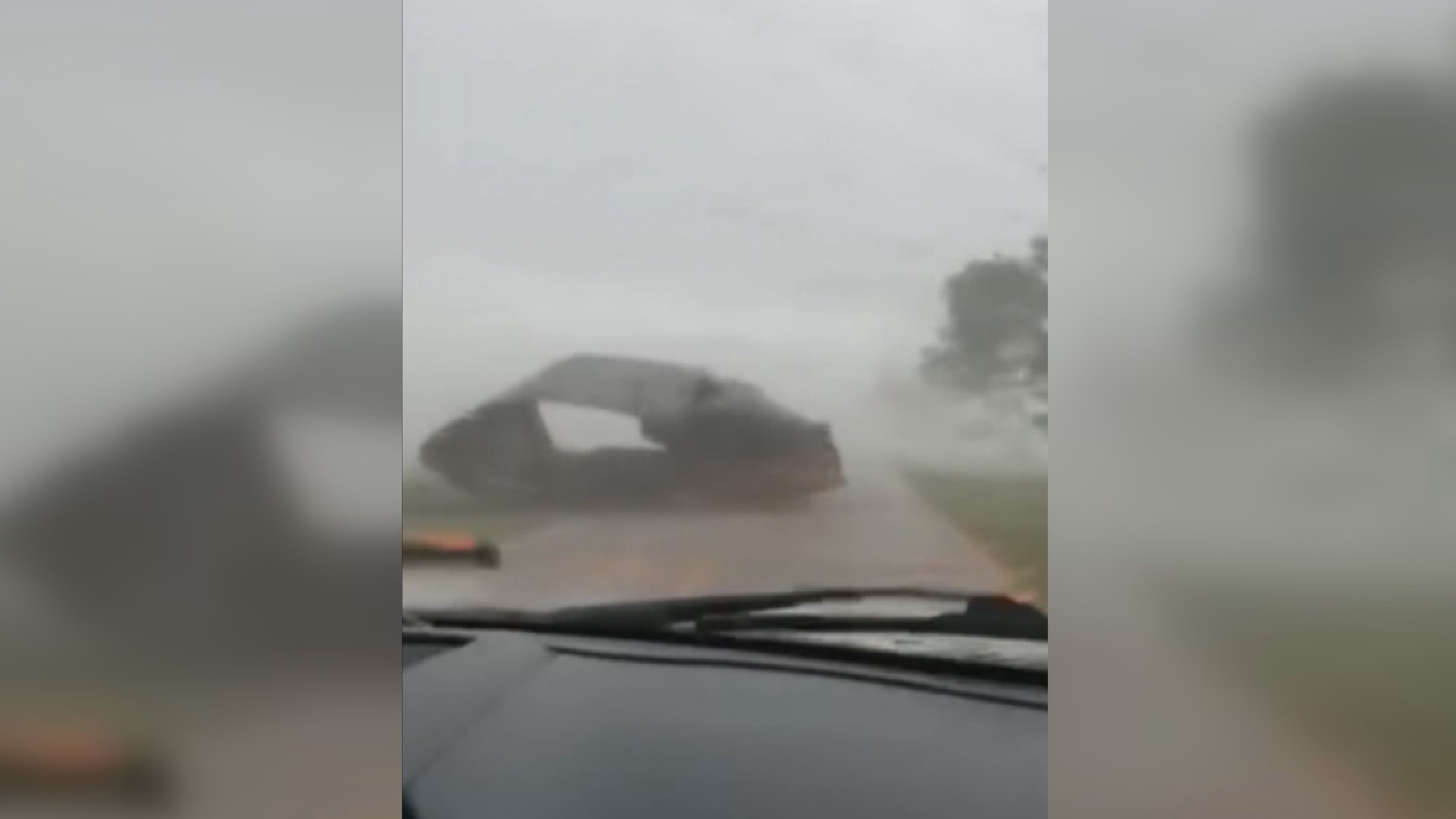 A South Carolina couple got stuck in high winds as a large tornado moved through the county.