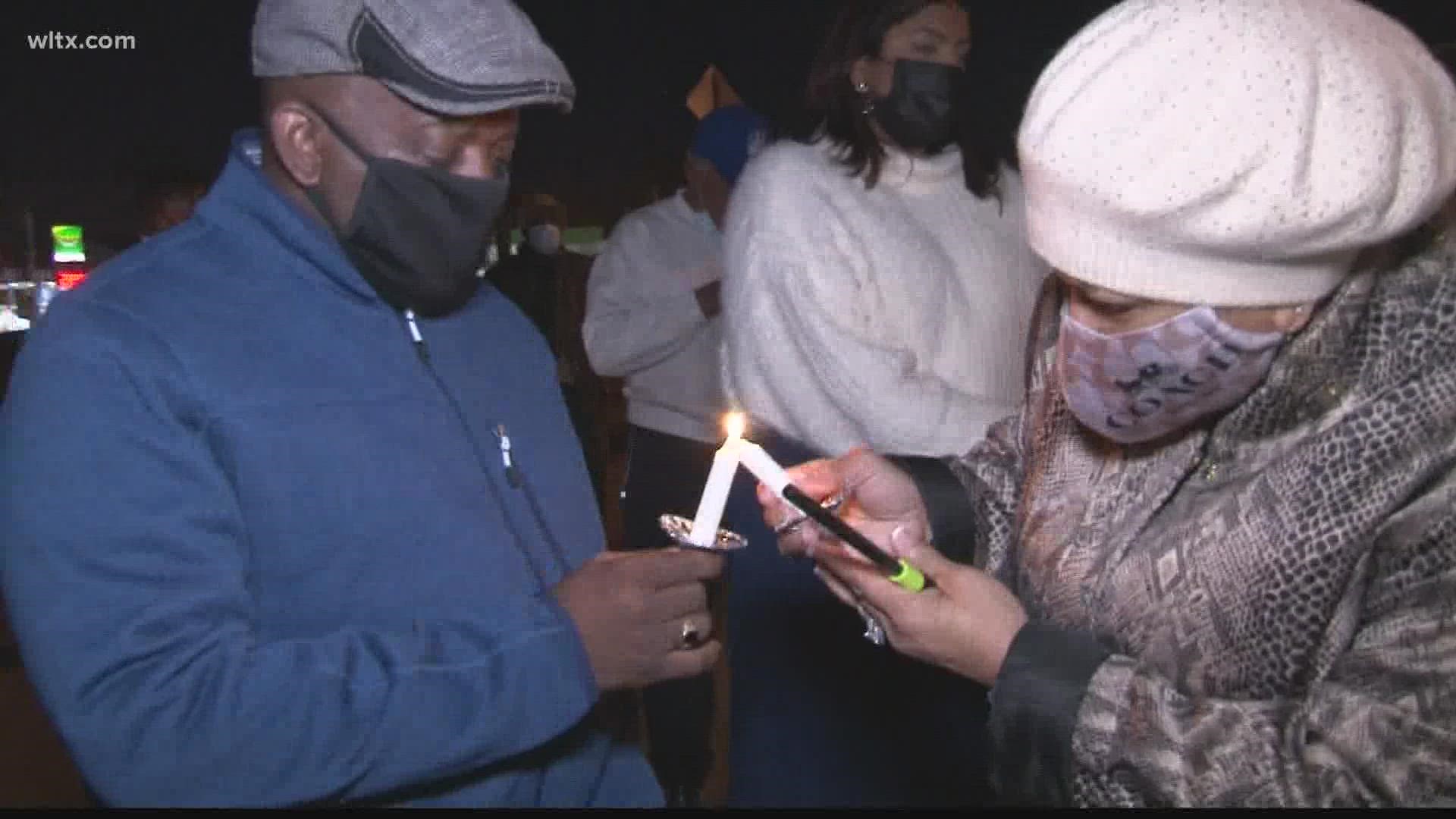 A prayer vigil was held in Columbia's North Main community in memory of those who've died from violent crime and to plea to stop it.