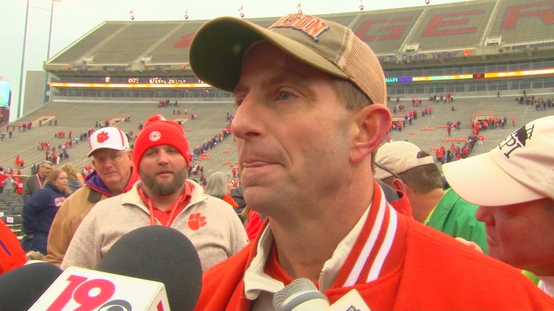 Clemson head football coach Dabo Swinney talks to reporters after Saturday's national championship parade and celebration.
