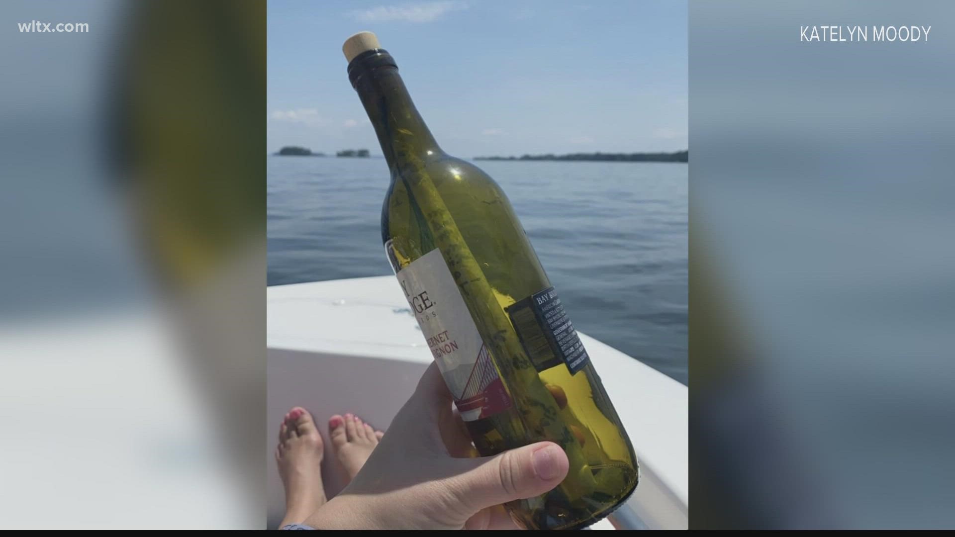 The couple picked up the bottle thinking it was trash.  It wasn't.