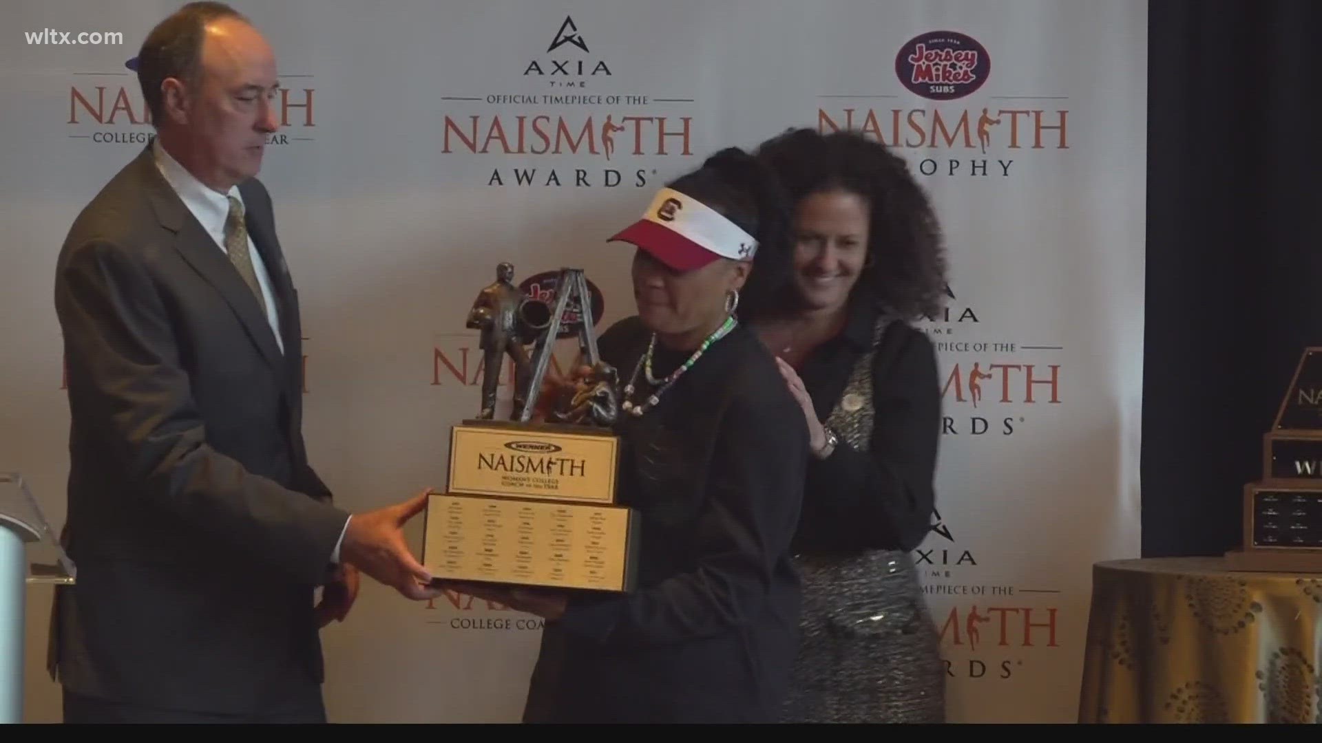 South Carolina head women's basketball coach Dawn Staley took her place on the stage in Cleveland as she was named national coach of the year.