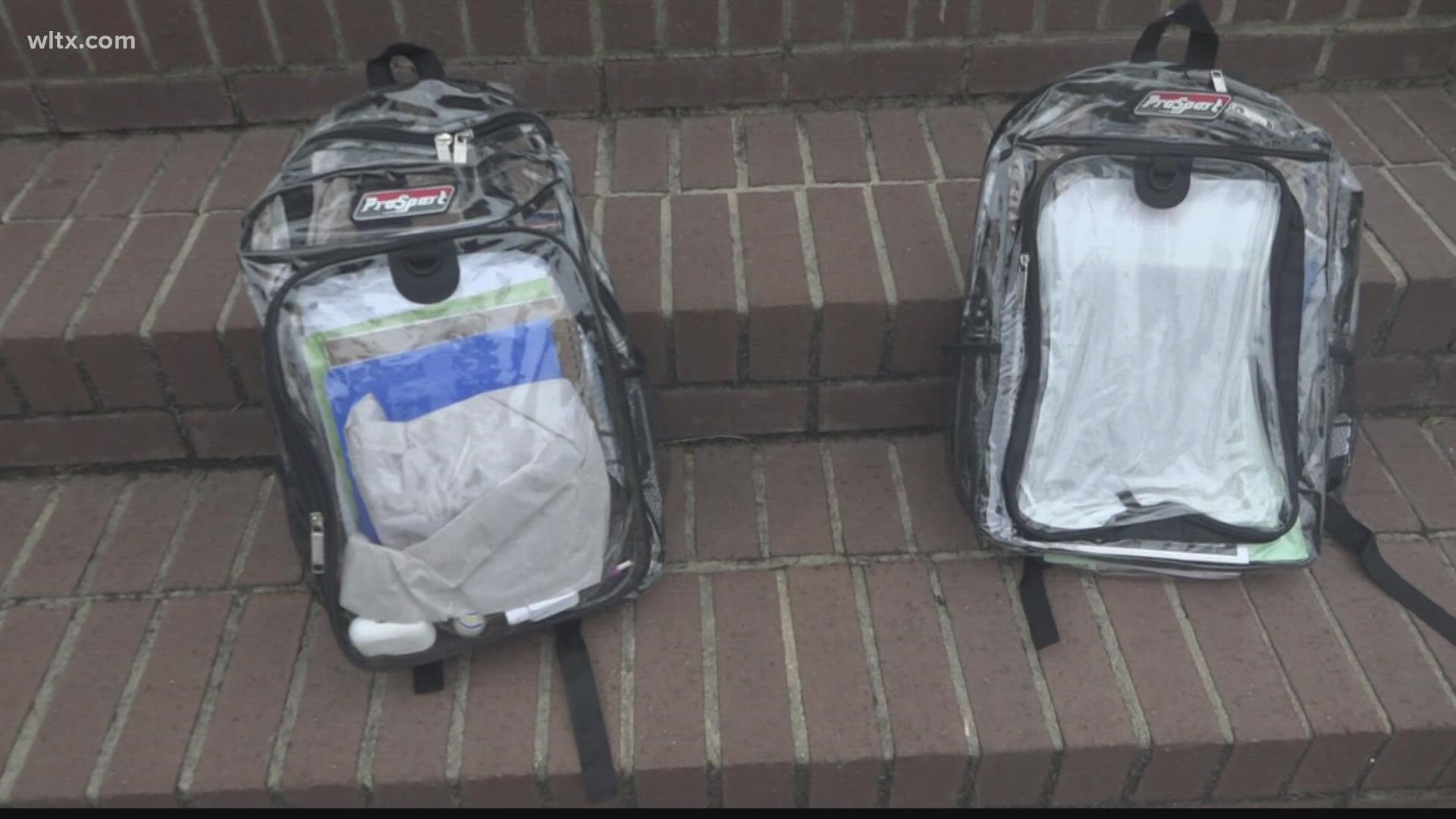 Students in middle and high schools will have to carry a clear backpack or purse while in school.