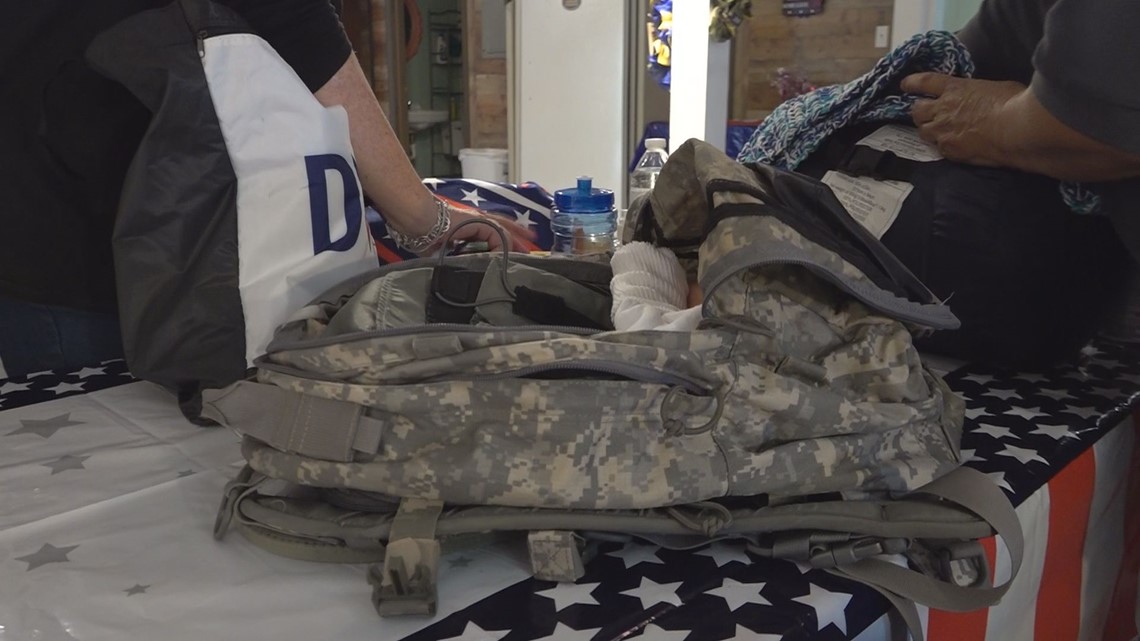 Elgin VFW 11079 packing backpacks for homeless vets
