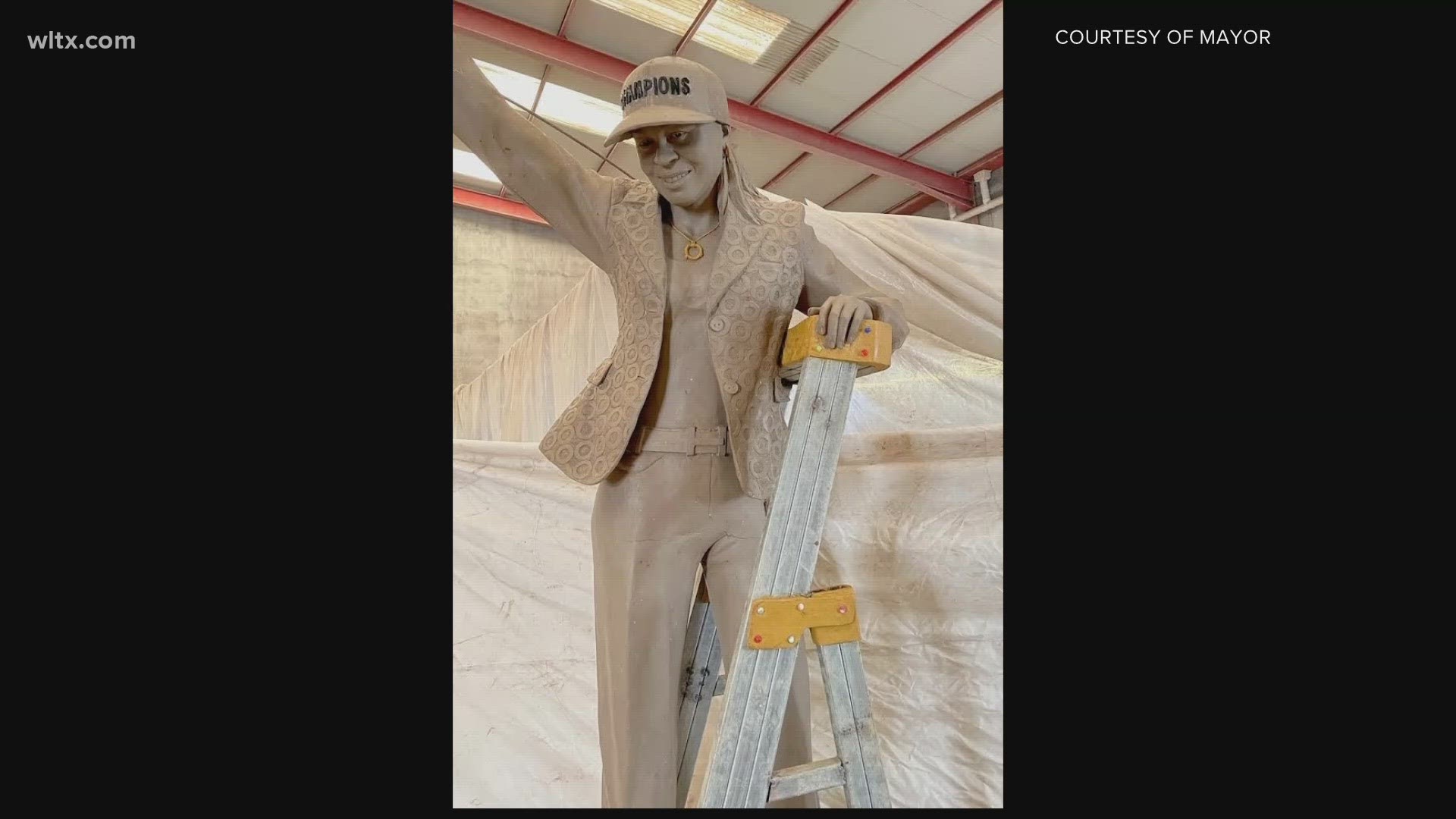 The statue of the coach will be placed in downtown Columbia.
