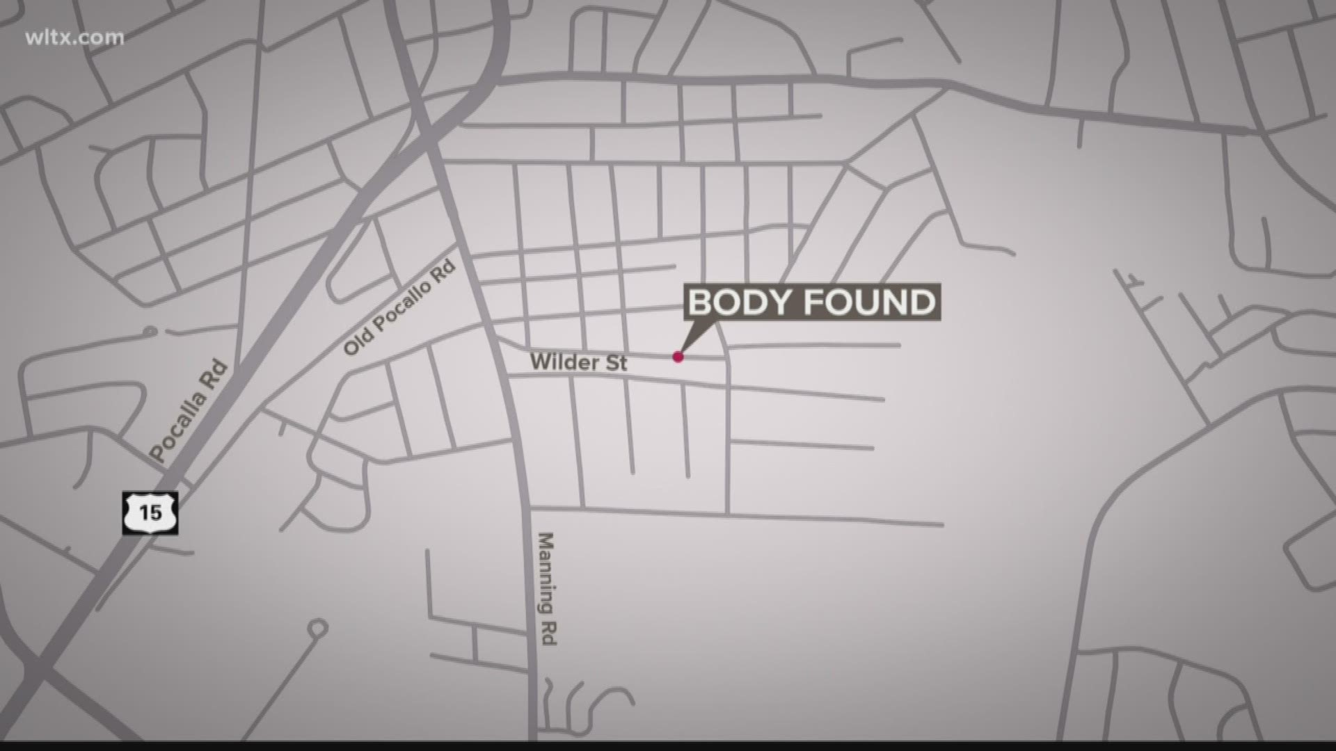 The body was found in the front yard of an abandoned house, according to officials.