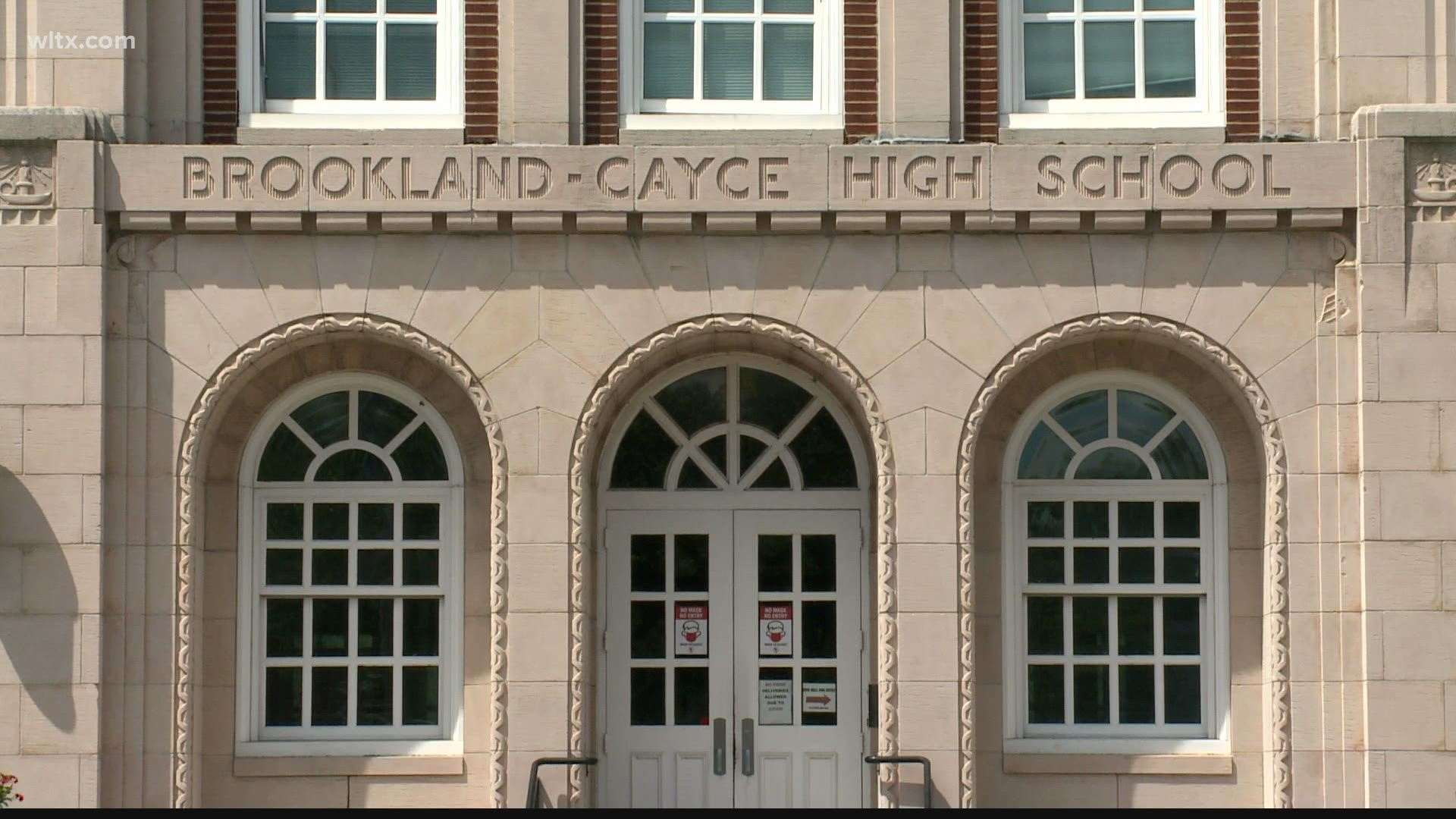 A high school assistant principal in Cayce has been ordered to turn himself in after an investigation into a school confrontation on Wednesday.