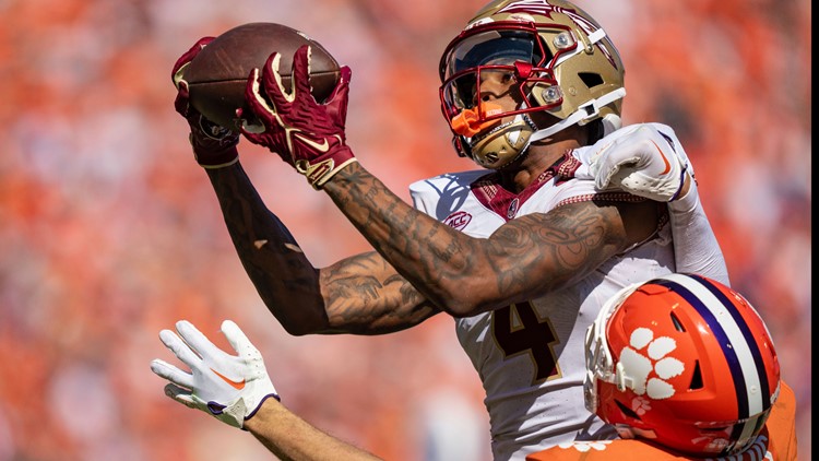 No. 4 Florida State snaps 7-game losing streak against Clemson with 31-24  victory behind Travis