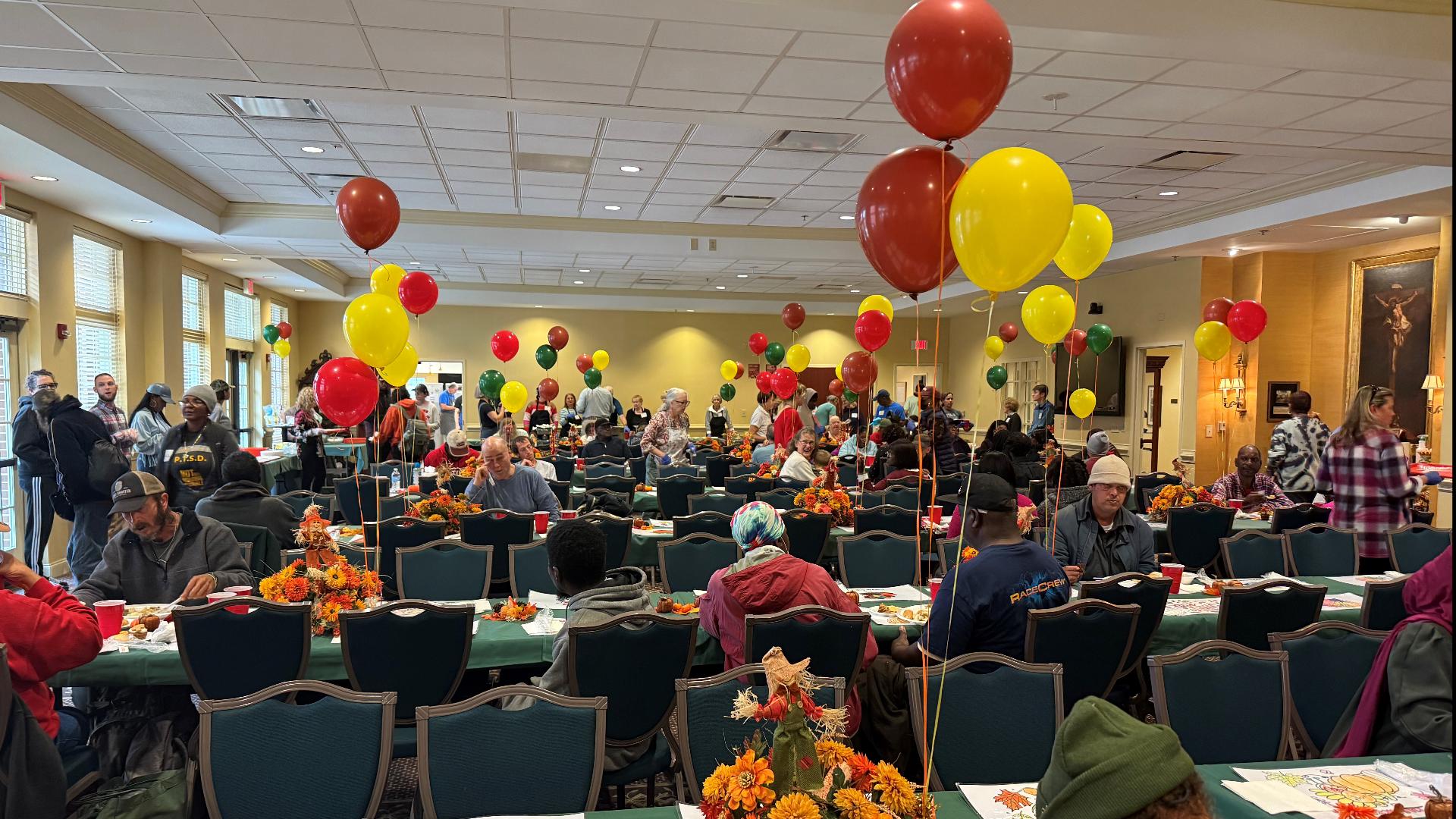 The church welcomes the community for a heartwarming Thanksgiving celebration of giving and unity.