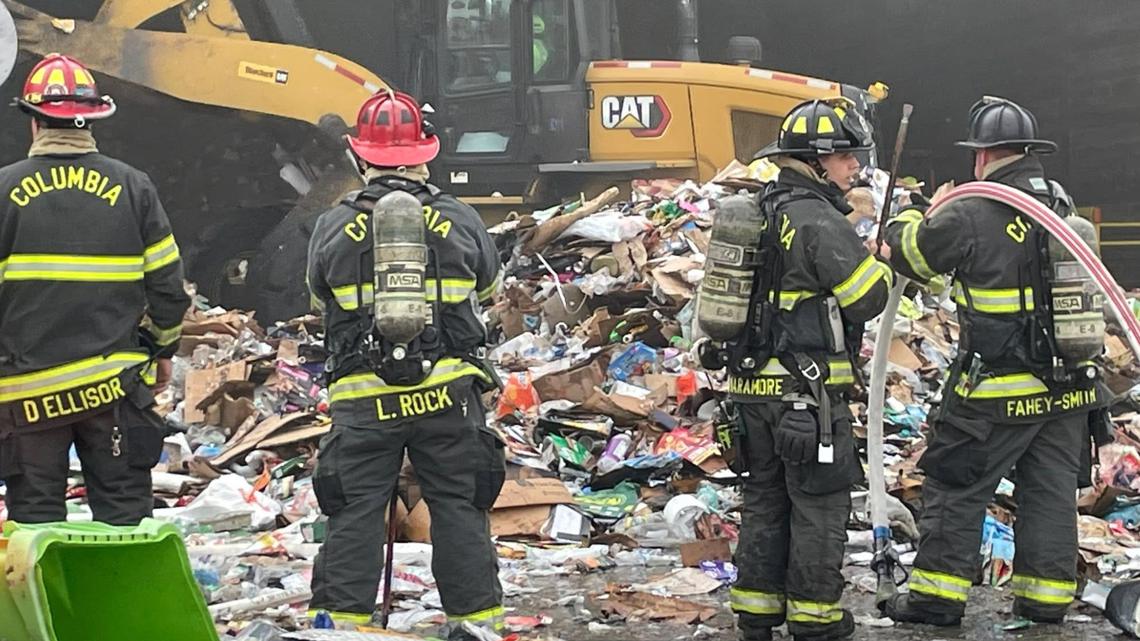 Crews dig through floor-to-ceiling material to put out Columbia recycling plant  fire | wltx.com