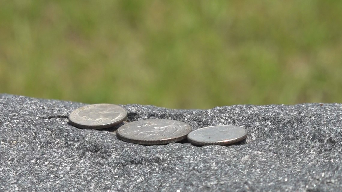 Coins mark visitors to military members' graves in Sumter | wltx.com