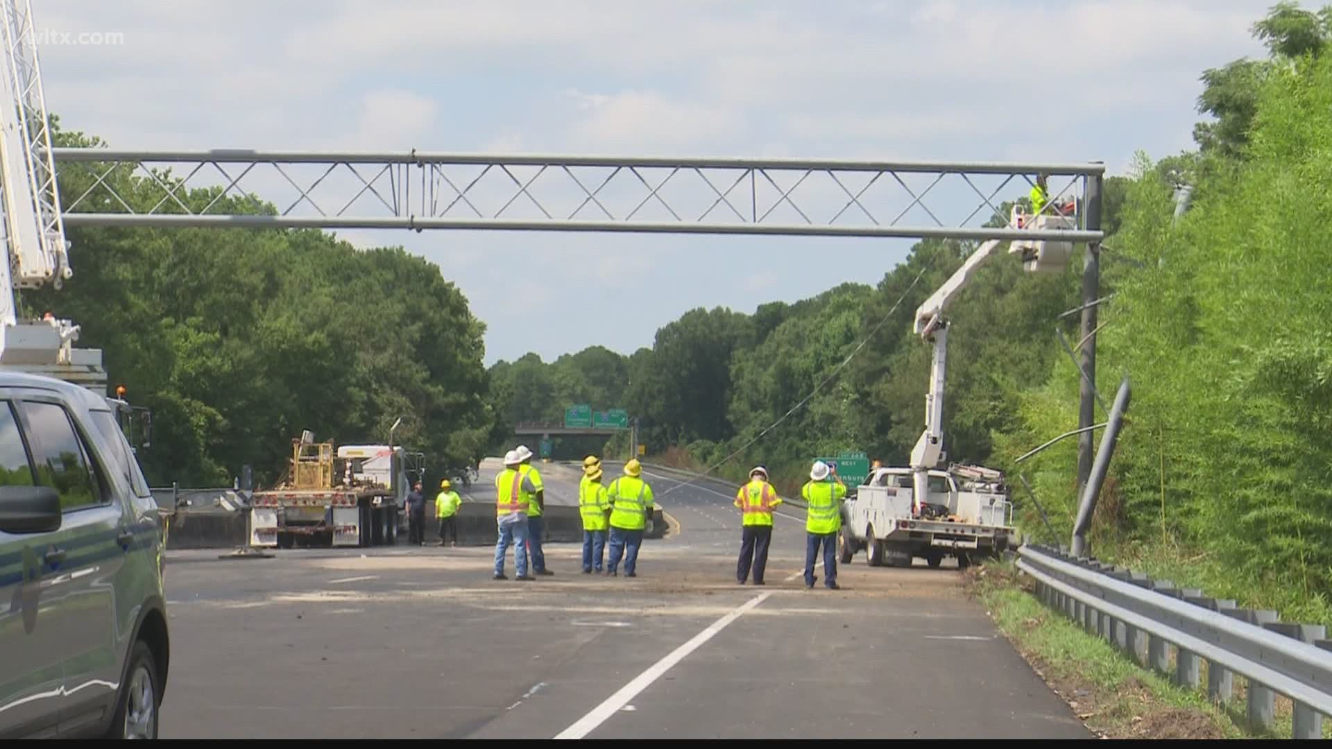 Accident caused damage to overhead sign, SCDOT repair crews on site